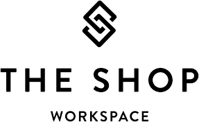 Logo for The Shop Workspace with a stylized geometric icon above the text.