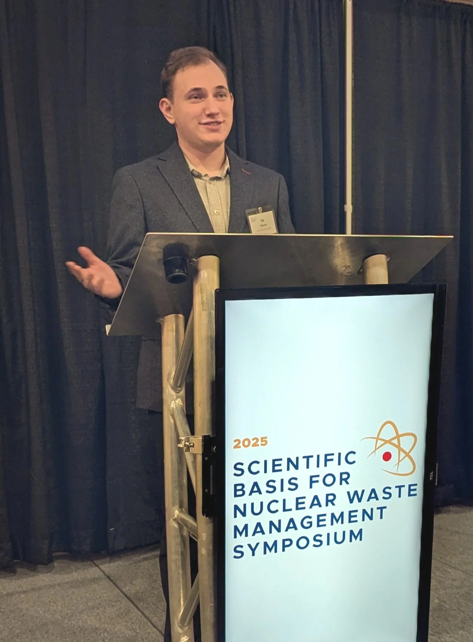 Kai presents his research on the big stage