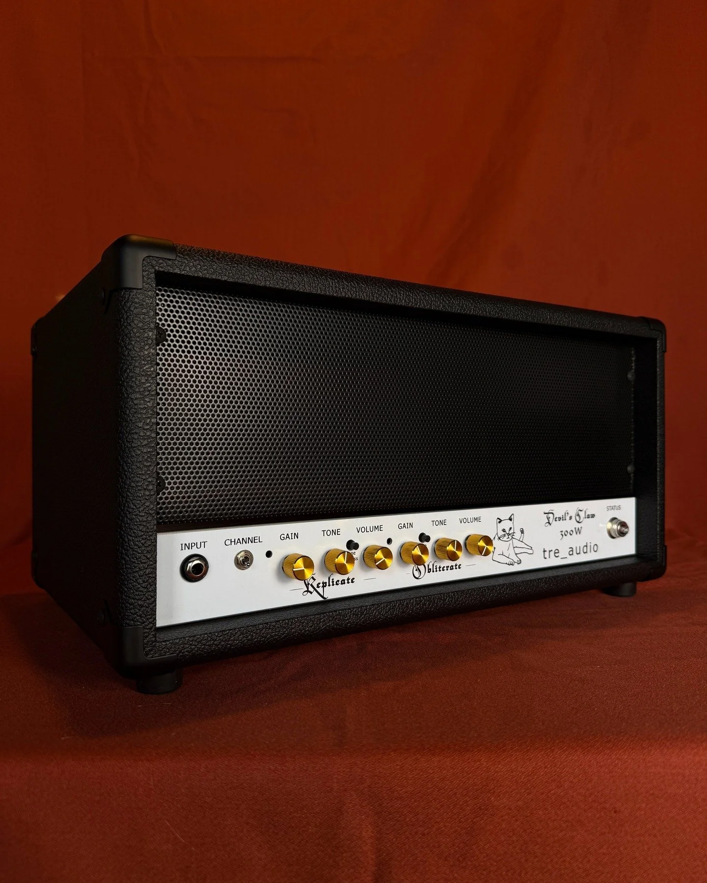 Devil's Claw 300W Guitar Amp.

Two-Channels with Gain, Tone, and Volume controls. Plus a Tone Bypass switch on the Replicate Channel and an Extra Gain Stage switch on the Obliterate Channel. Bi-Color LED Status light changes from Green to Red if the 