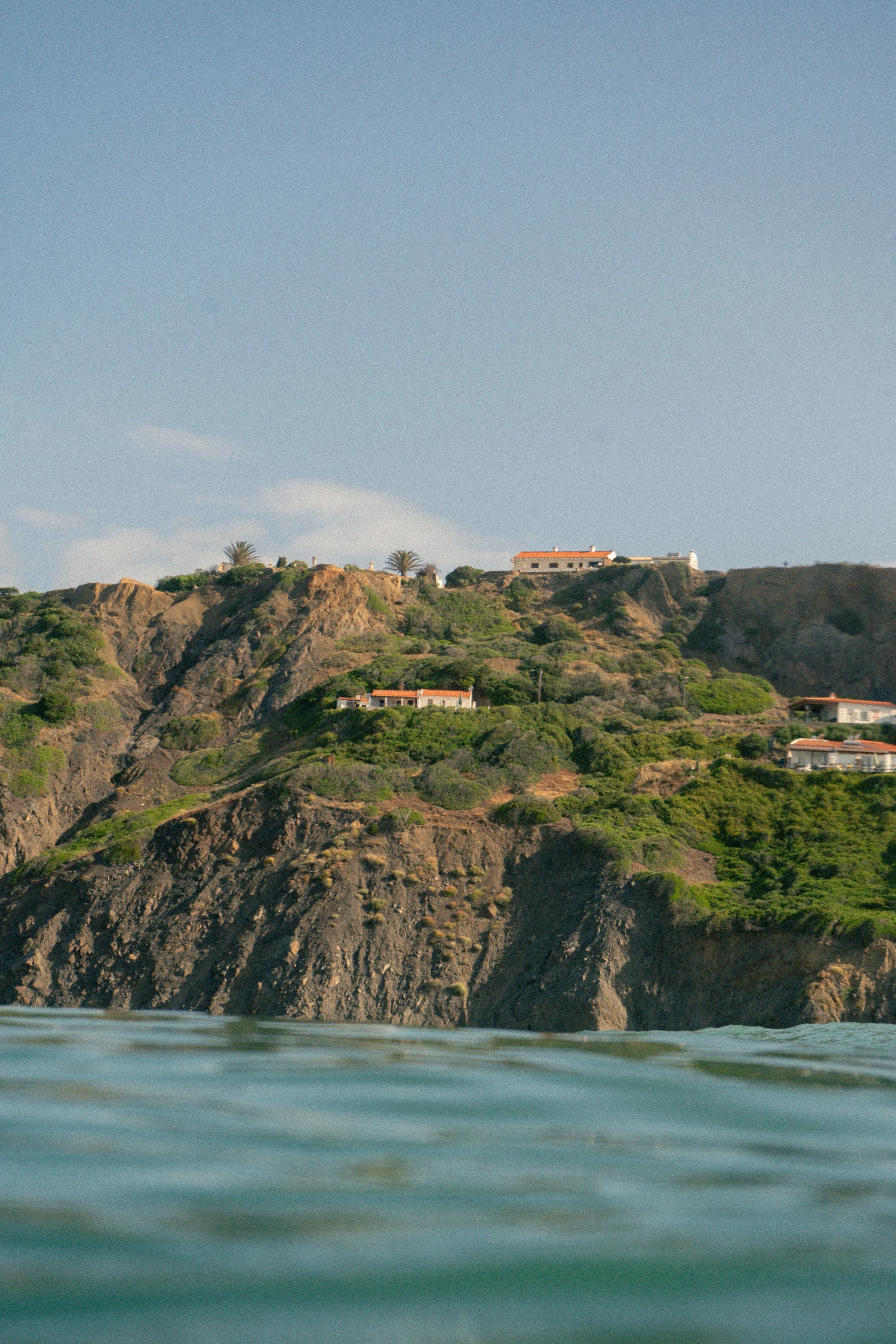In-water shot from the ocean of a Lagos, Portugal cliff