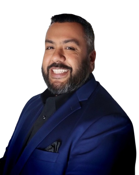 Carlos wearing a blue tux