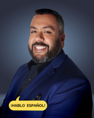 Carlos wearing a blue tux