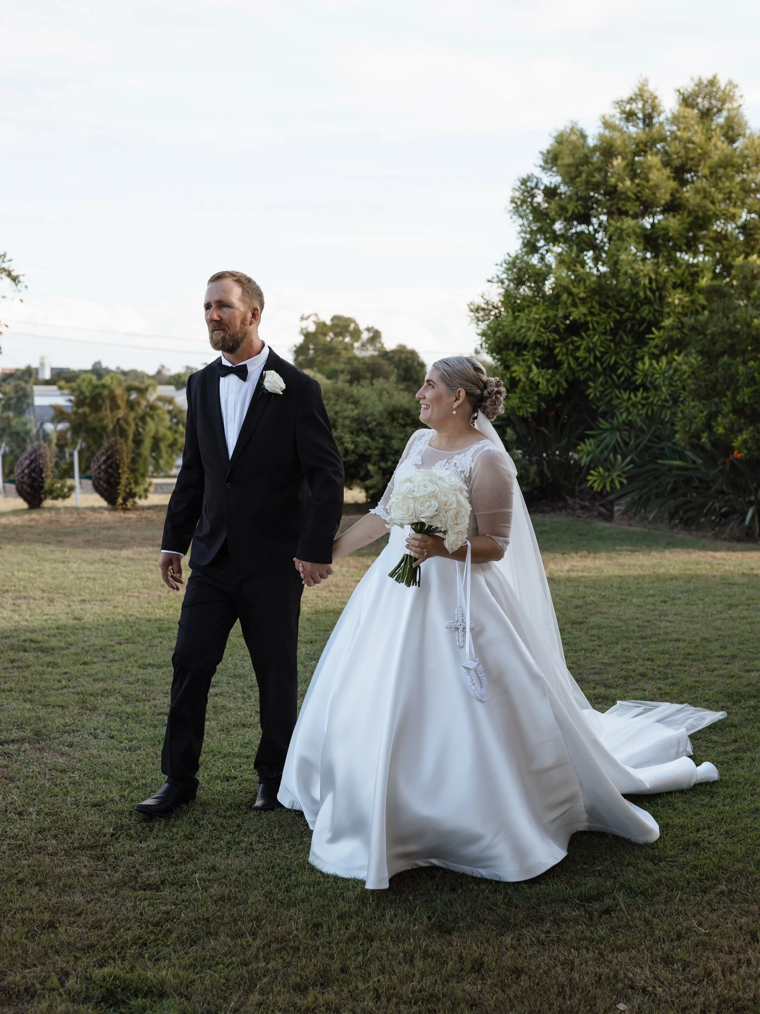 There&rsquo;s something about a classic black tux and a silk gown at that never misses ✨

#countryweddingphotographer #cqweddingphotographer #rockhamptonweddingphotographer #whitsundayweddingphotographer #qldweddings