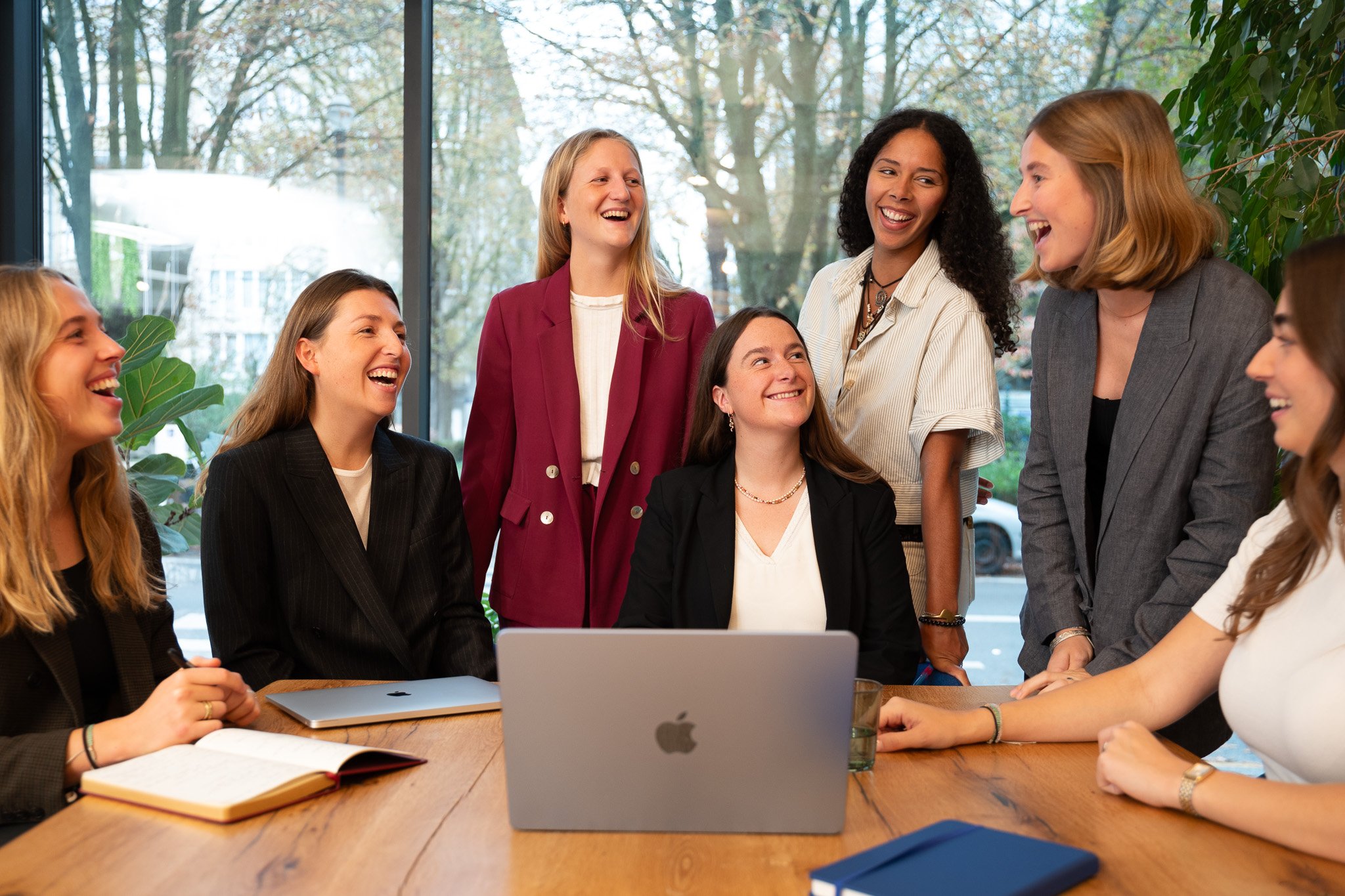 picture of working ladies around a table