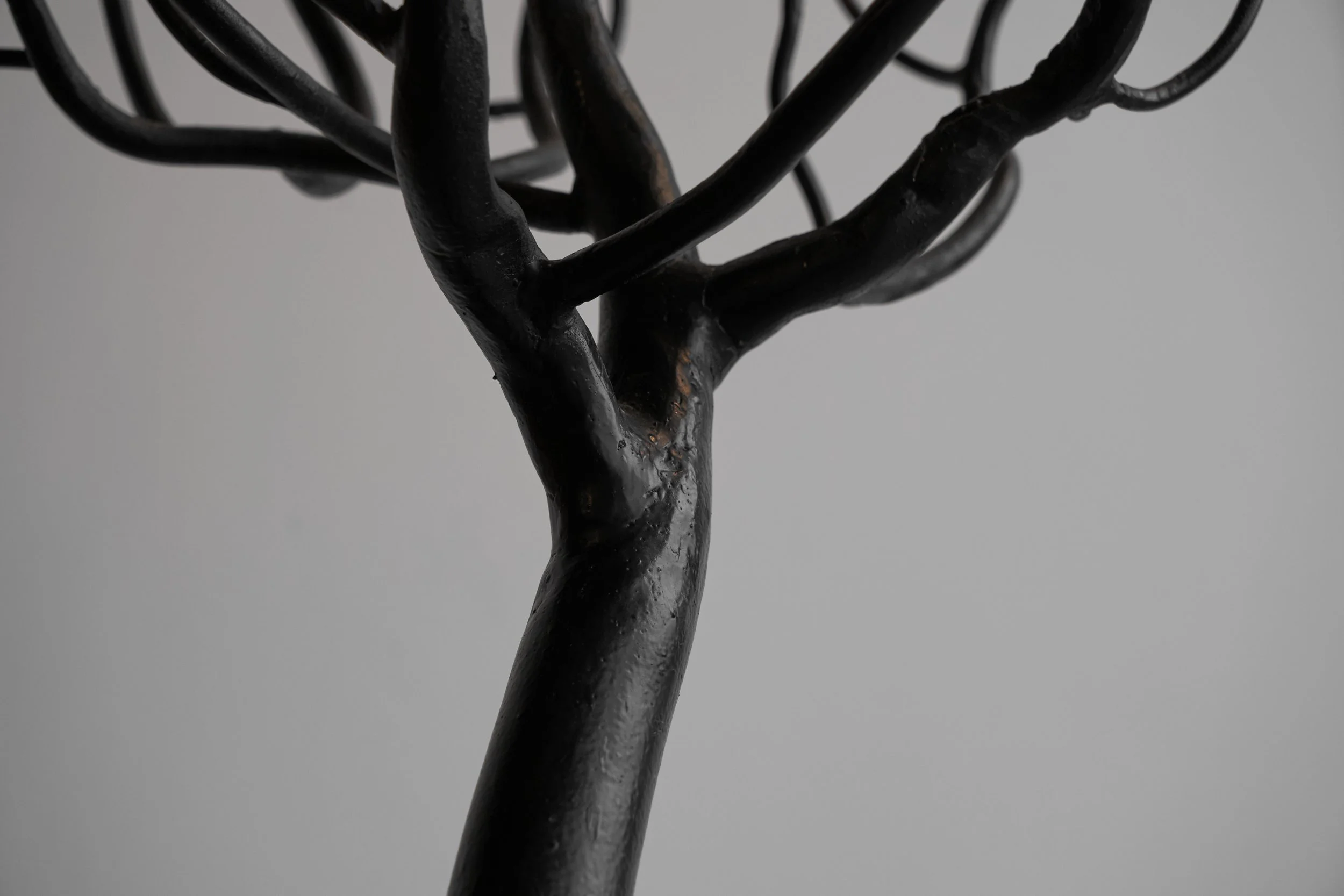 Large Tree Shaped Candle Holder in Hand Forged Steel front mid detail