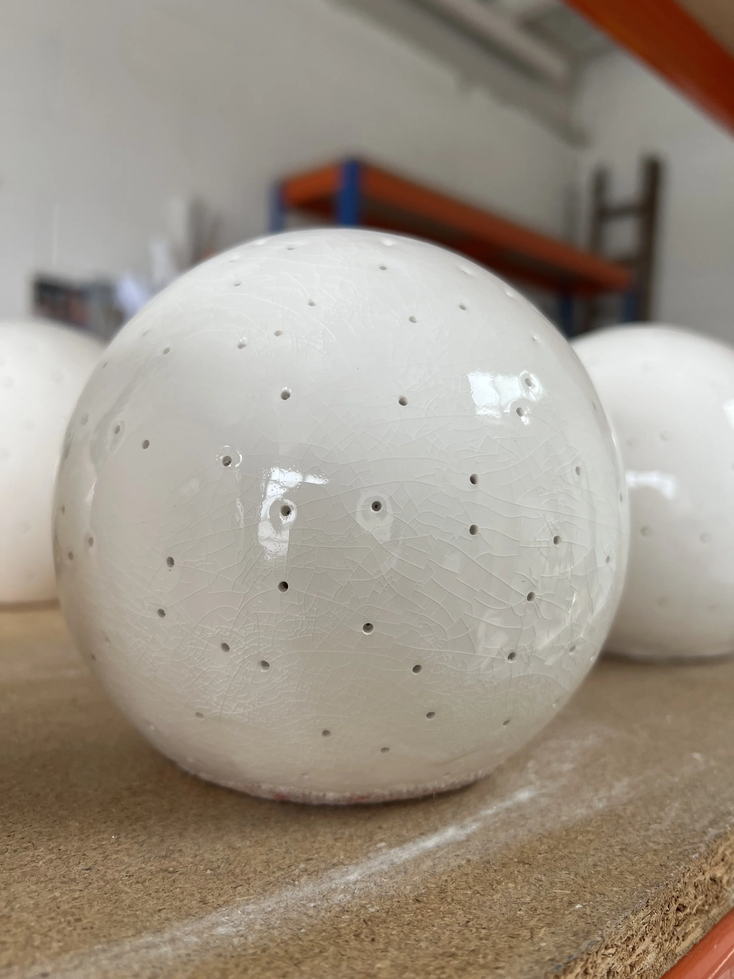 AEP Studios - Porcelain sphere, crackle glaze, 2024