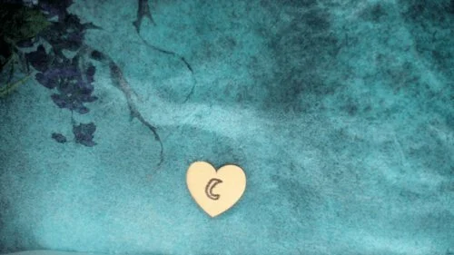 The letter L represents the moon in the pagan witch symbols