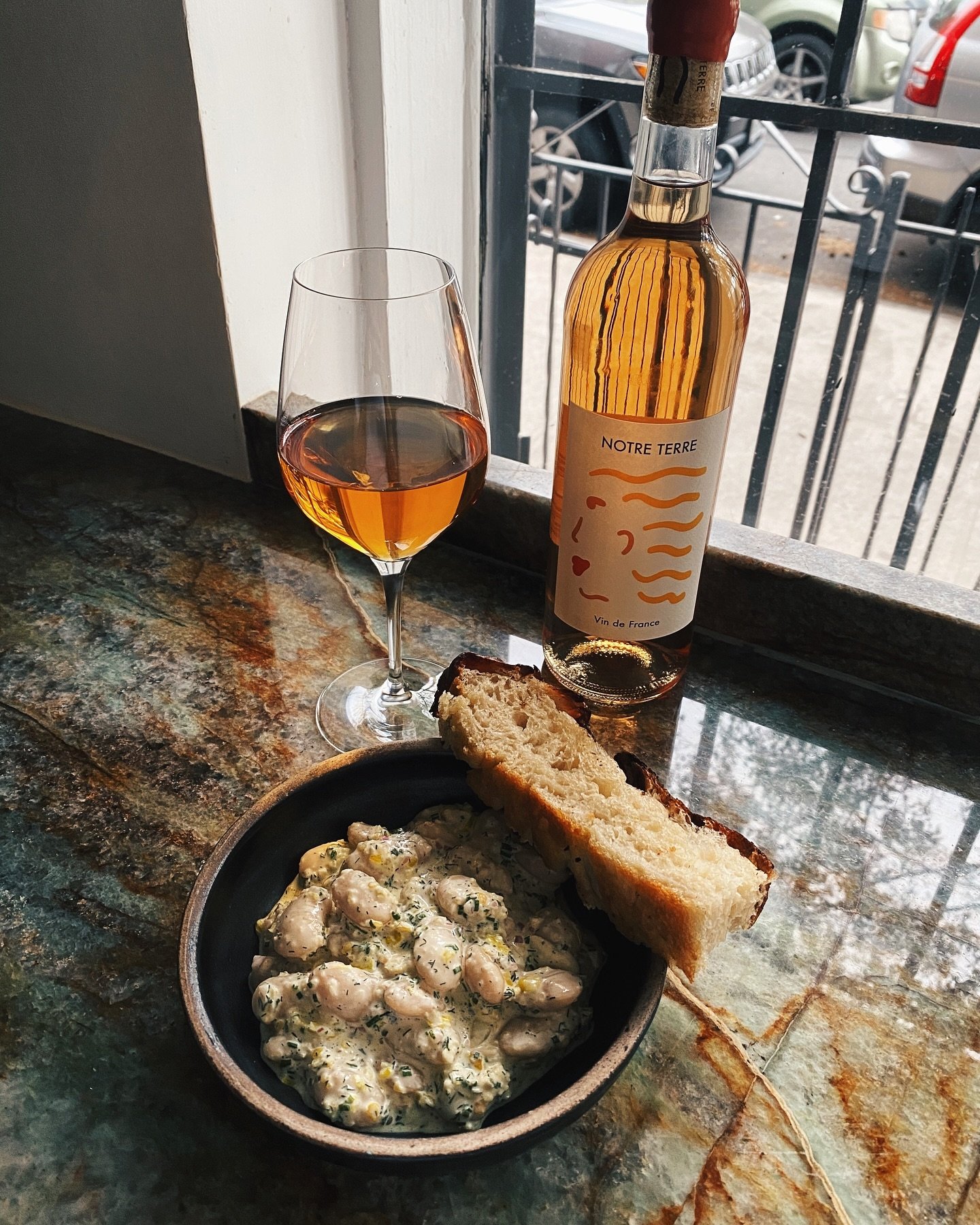 With sunny spring days comes new menu items! 

New food alert, GIGANTE BEAN SALAD. Chilled aioli base, pepperoncini, dill, shallots, house-made focaccia. 

New wine alert, NOTRE TERRE. This crisp, light orange is breezy with mineral acidity, tart man