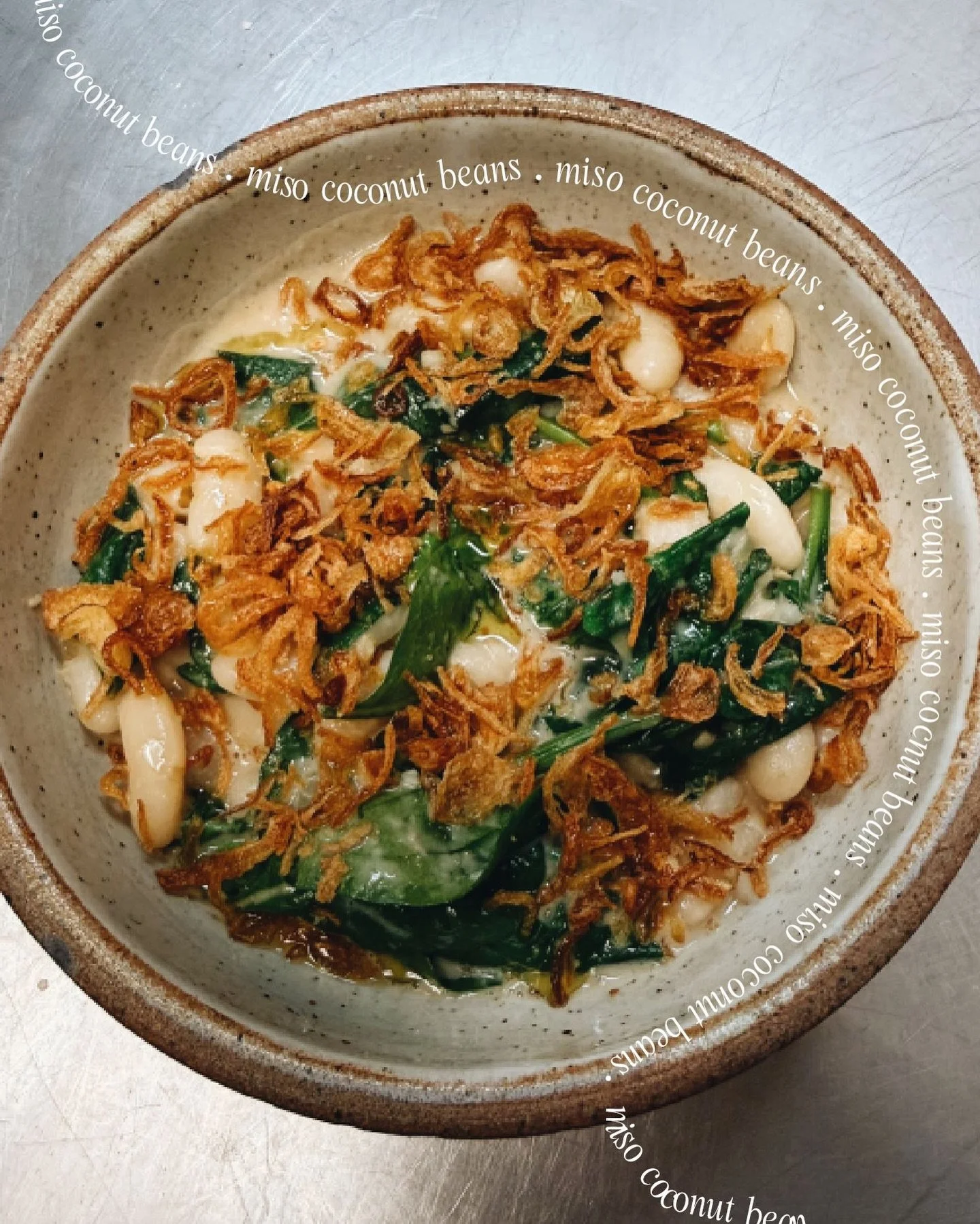 Warm umami broth, creamy beans, and crispy, sweet shallots&hellip;

Available Wednesday-Sunday for dinner (and brunch, with a twist!).