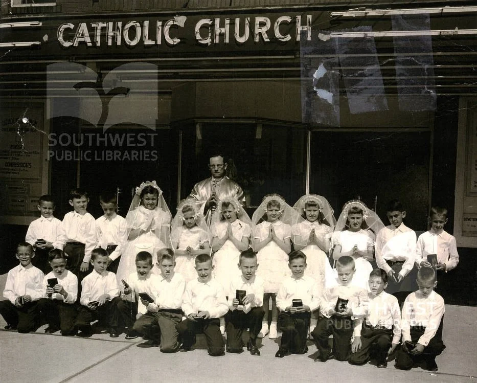 front entrance to Our Lady of Perpetual Help in the 1950&rsquo;s. A group of young church members are depicted after their First Communion. This building is currently the Little Theater Off Broadway #grovecity #catholic #priest #history #american250