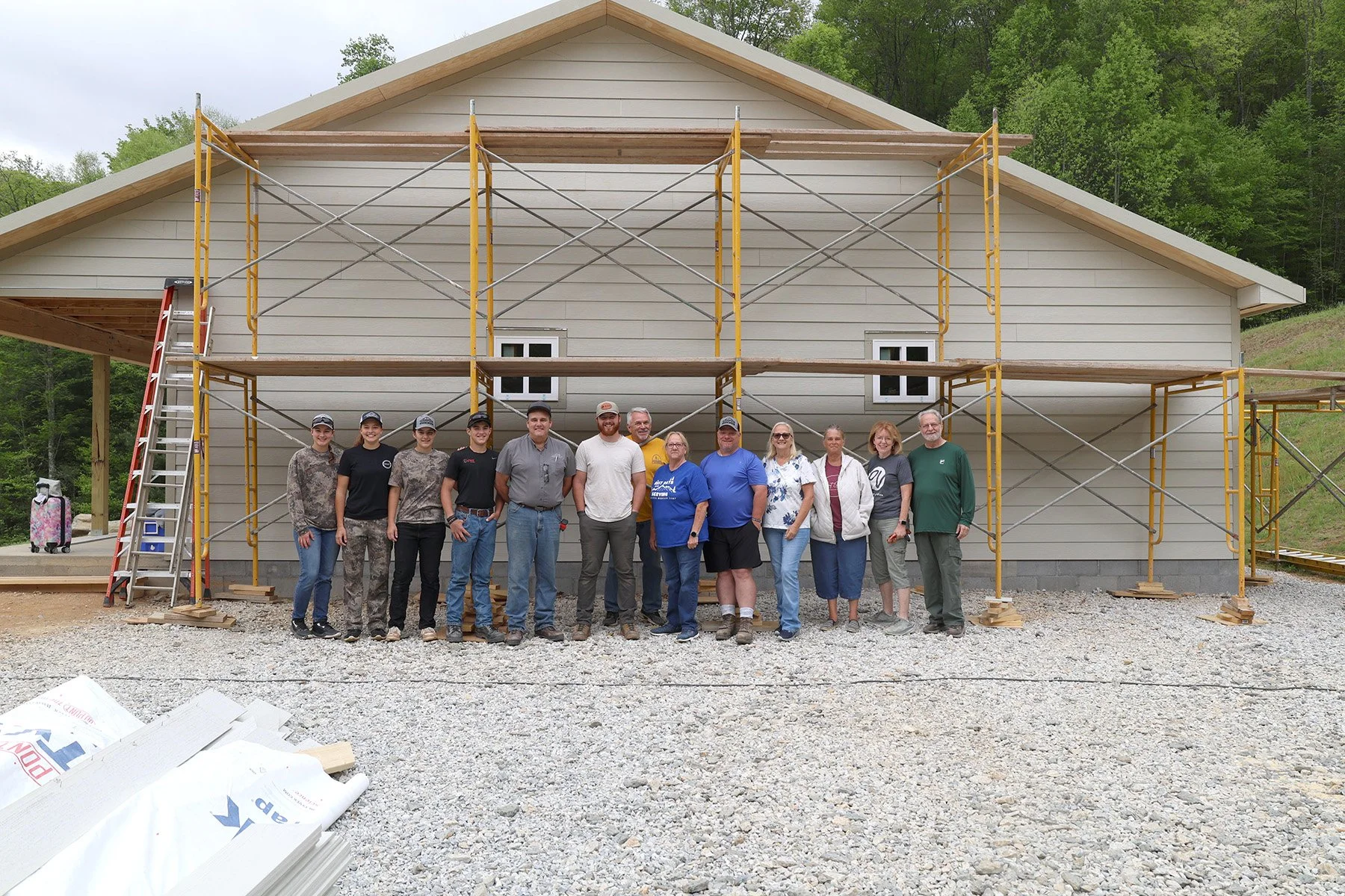 CWE WK2 Group With Building.jpg