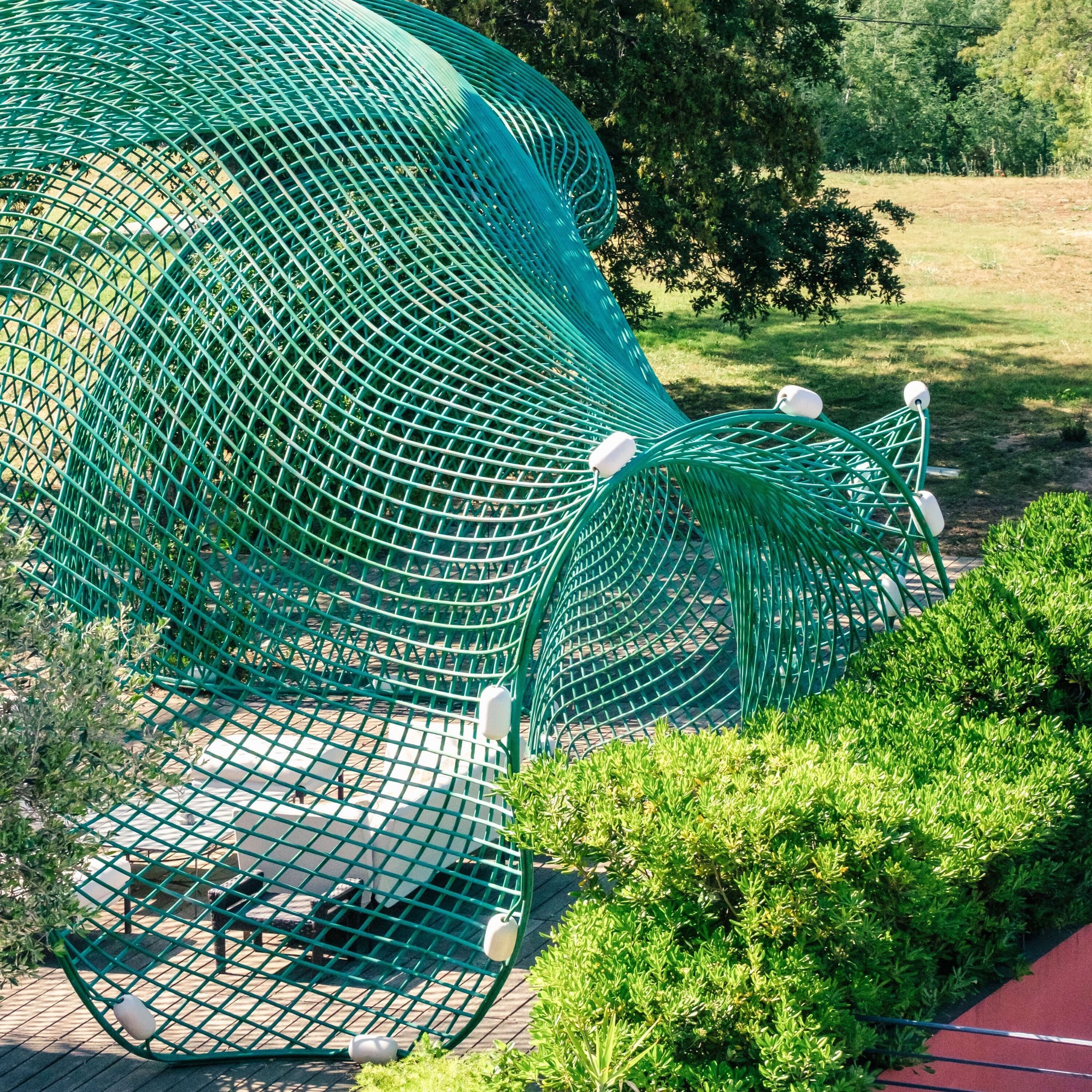 Meet &ldquo;The Net,&rdquo; a dazzling stainless steel installation meticulously created by the brilliant artist Wang Luyan. 

With each twist and turn, The Net tells a tale of the sea, embodying the essence of the drag net used in fishing. As you mo