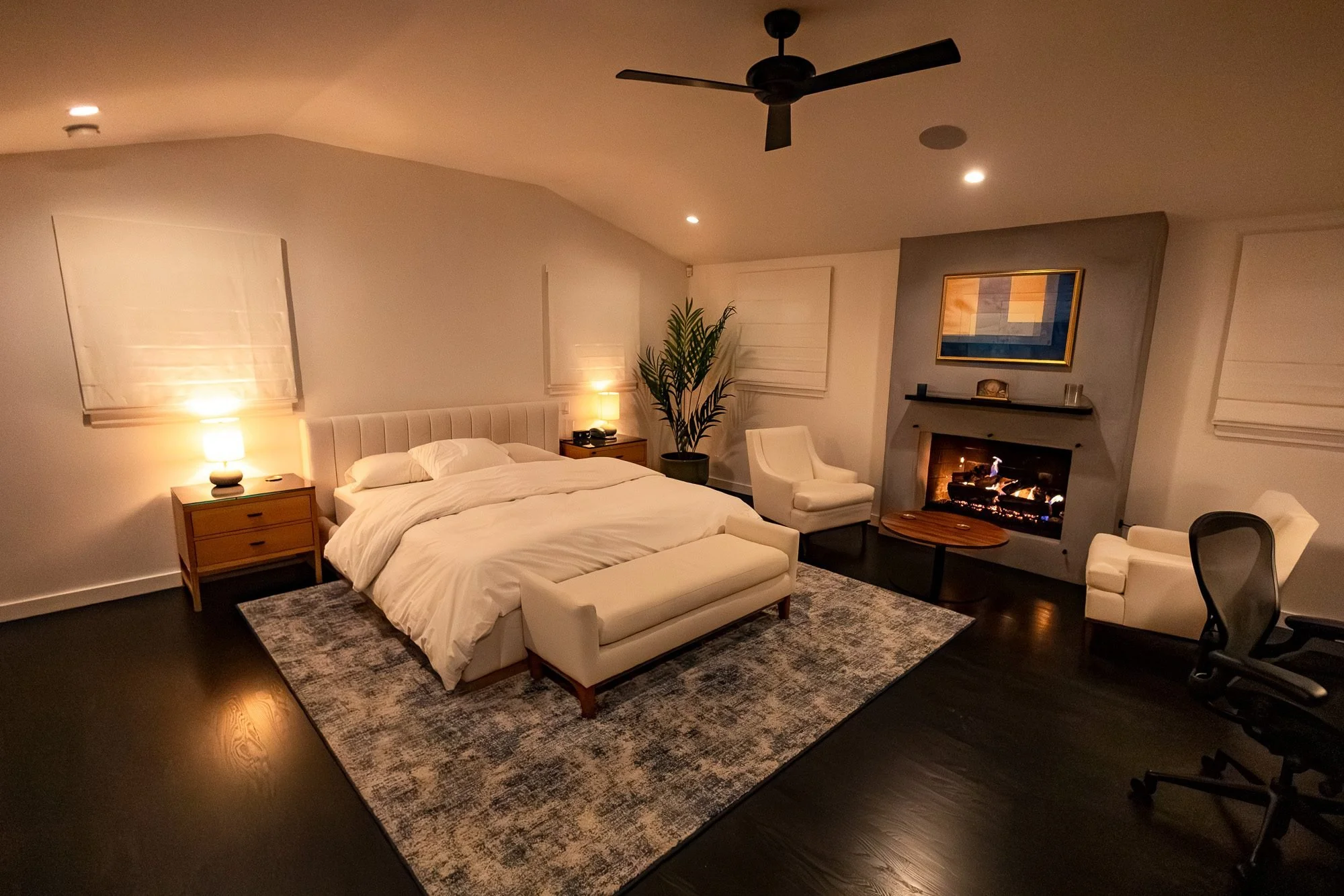 Bedroom with king bed and gas fireplace