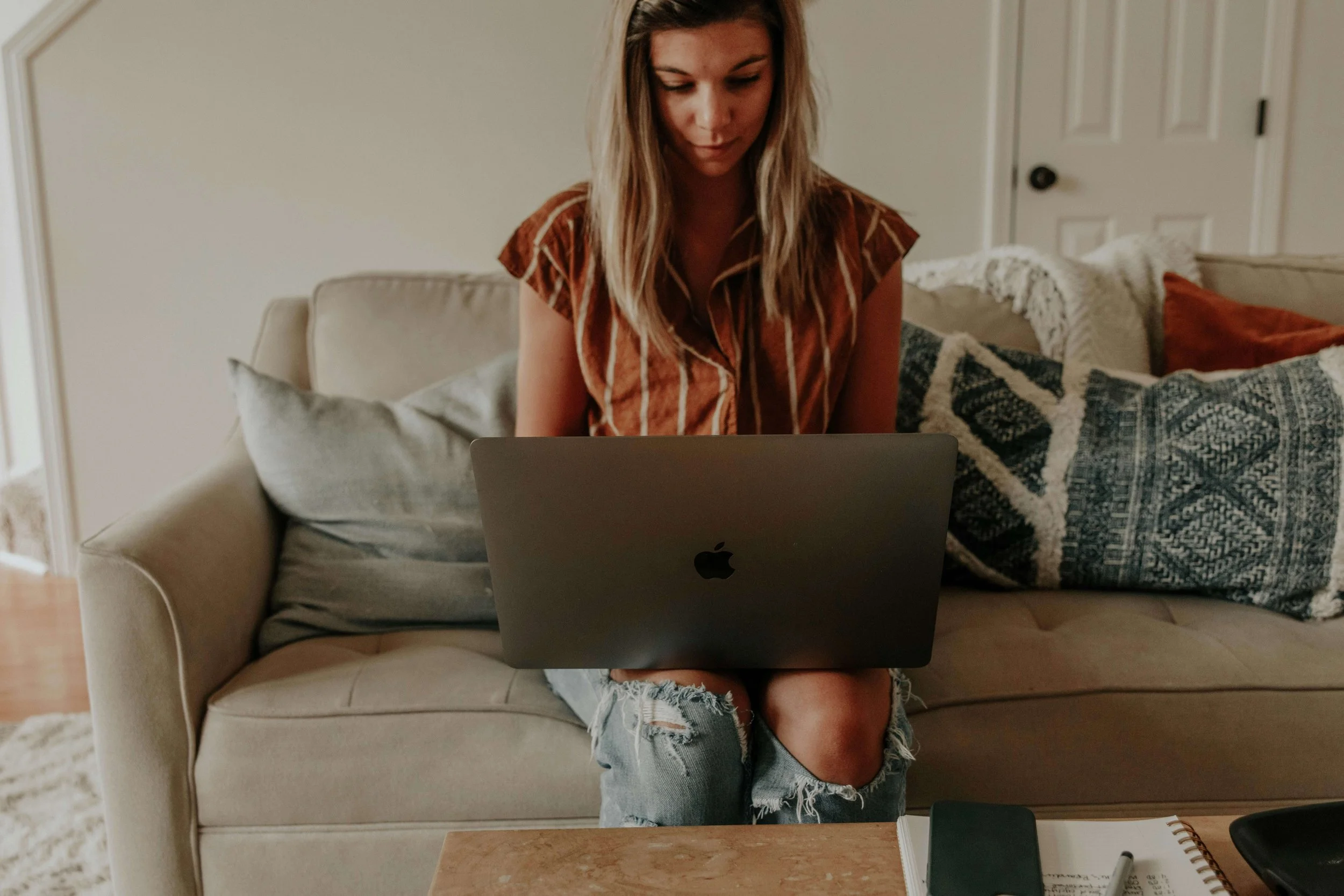 A woman attends an online therapy session from home. Online Christian counseling in Columbus, OH, can help mothers process unhealed childhood trauma, anxiety, and emotional overwhelm through compassionate faith-based therapy.