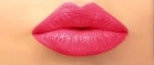 Close-up of pink lipstick on lips