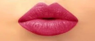 Close-up of lips with pink lipstick