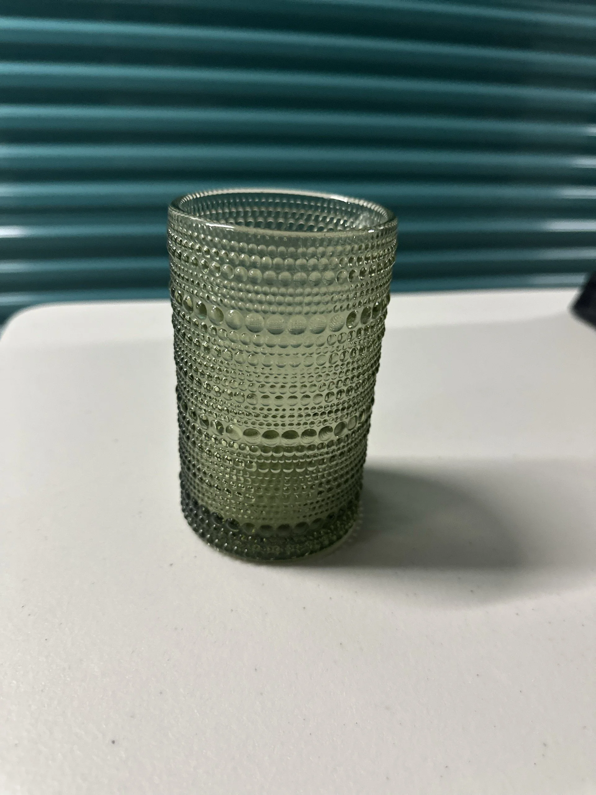 Green glass cup