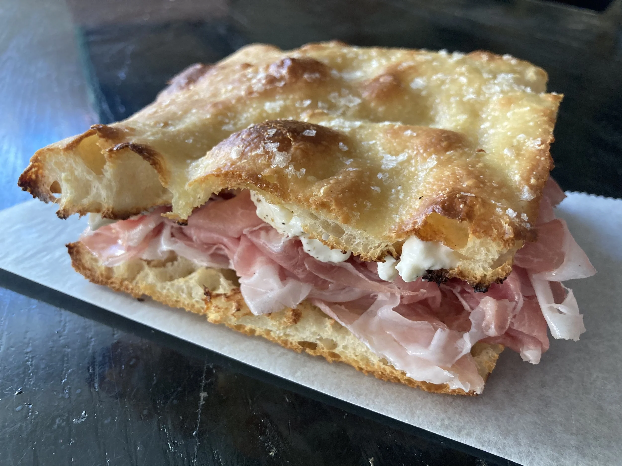 Fresh & flakey, crusty and salted; our bread makes this mortadela sandwich fabulous.