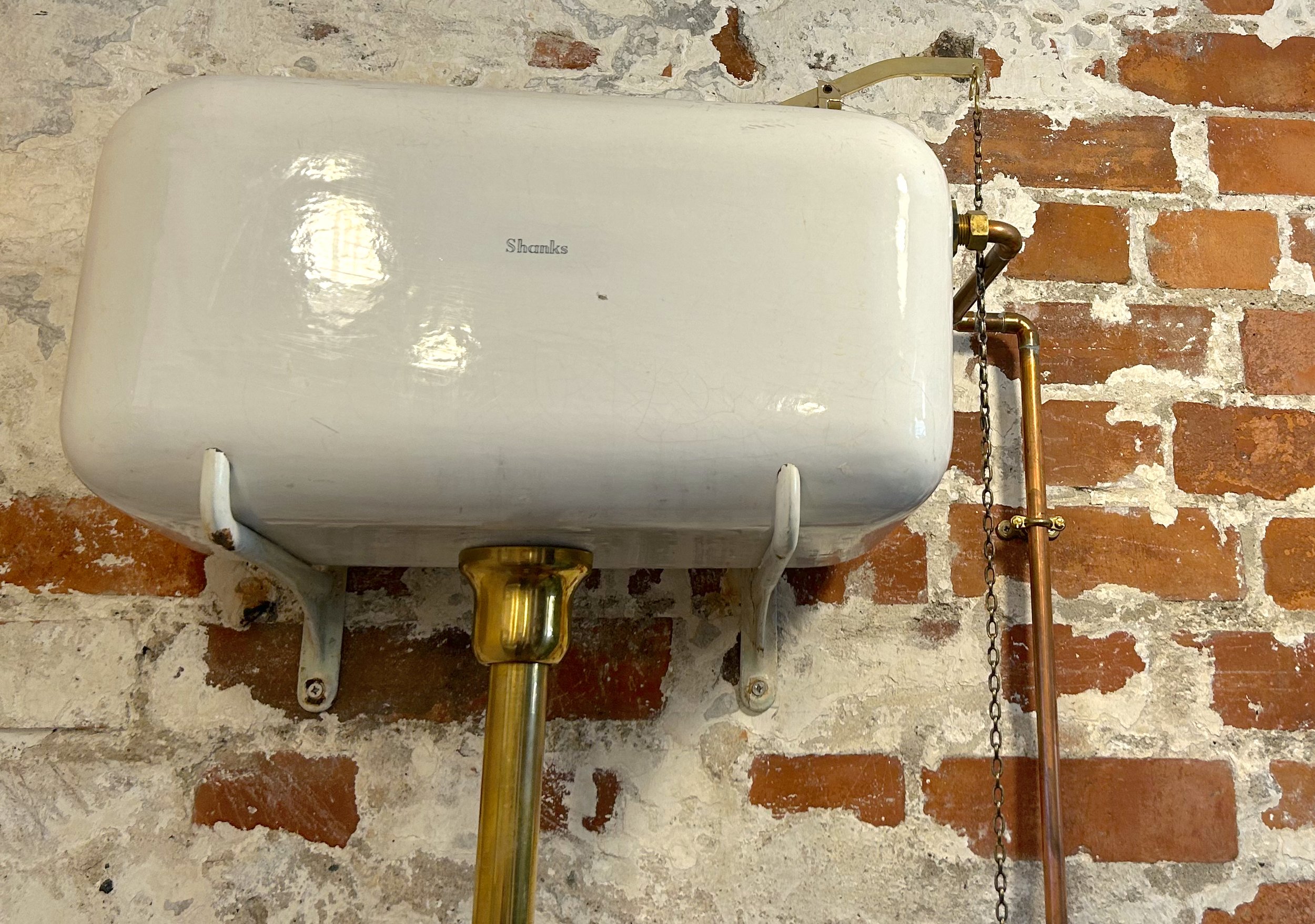 Elegant antique flush installation by CRS Plumbing and Heating for a period-style bathroom in West Cornwall.