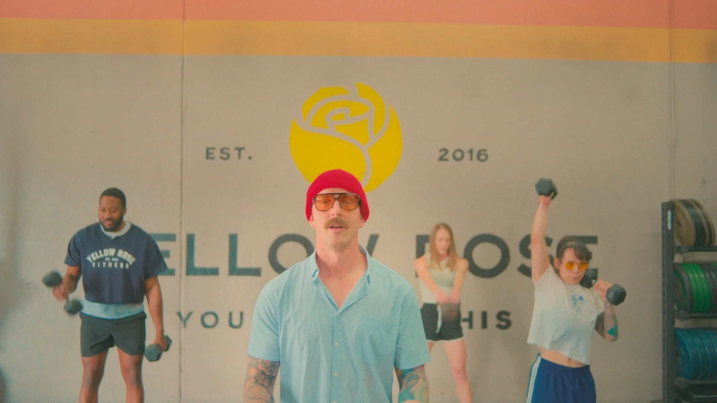 Wes Anderson inspired still frame from a tour video for  Yellow Rose Fitness