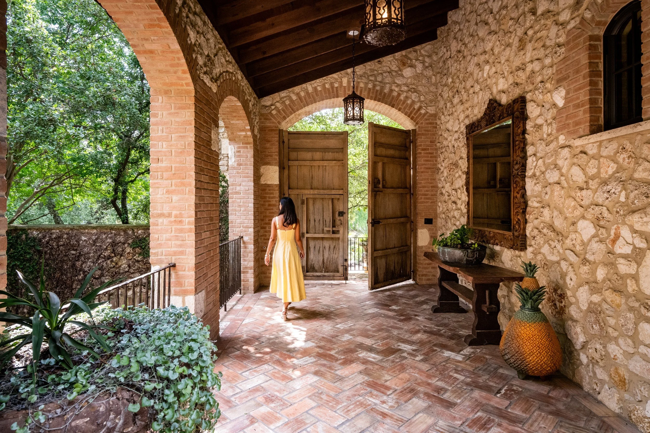 Image of a woman walking through a resort
