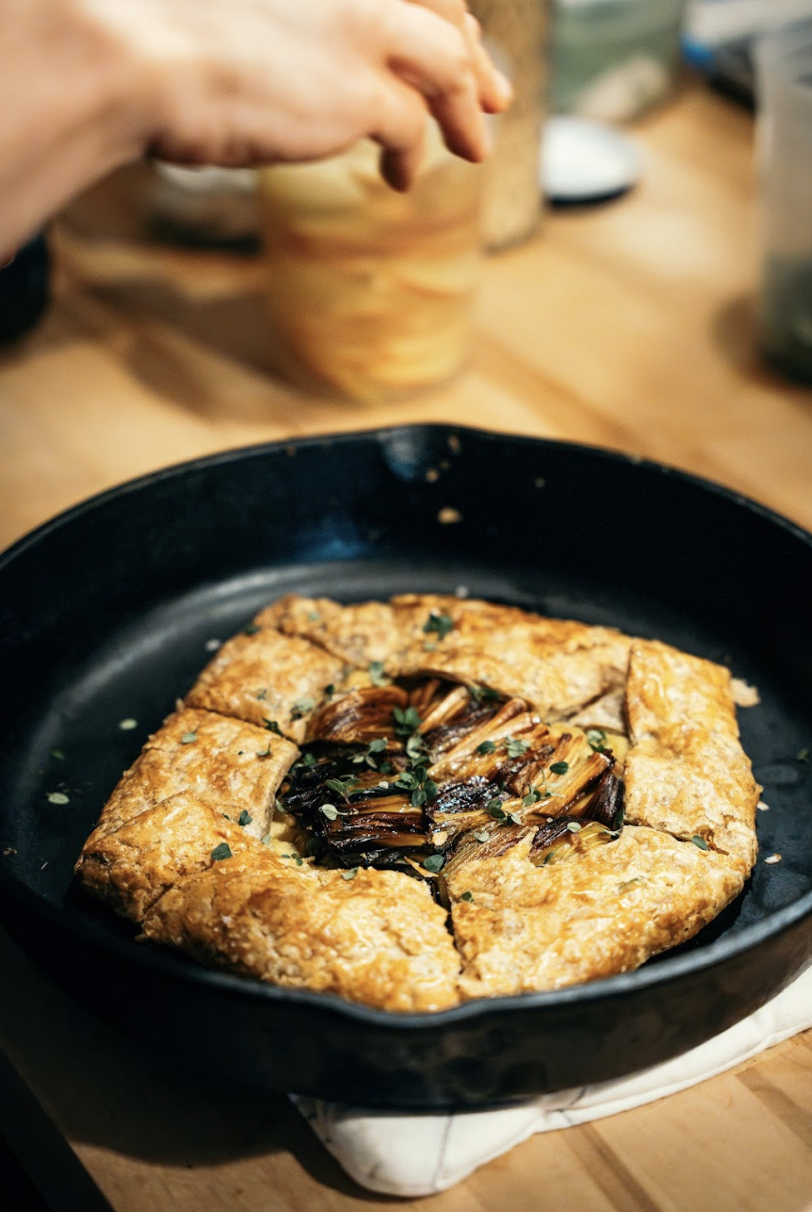 Winter live-fire catering menu preview from Hearth & Harvest, highlighting comforting, seasonal dishes for intimate Southern California gatherings.