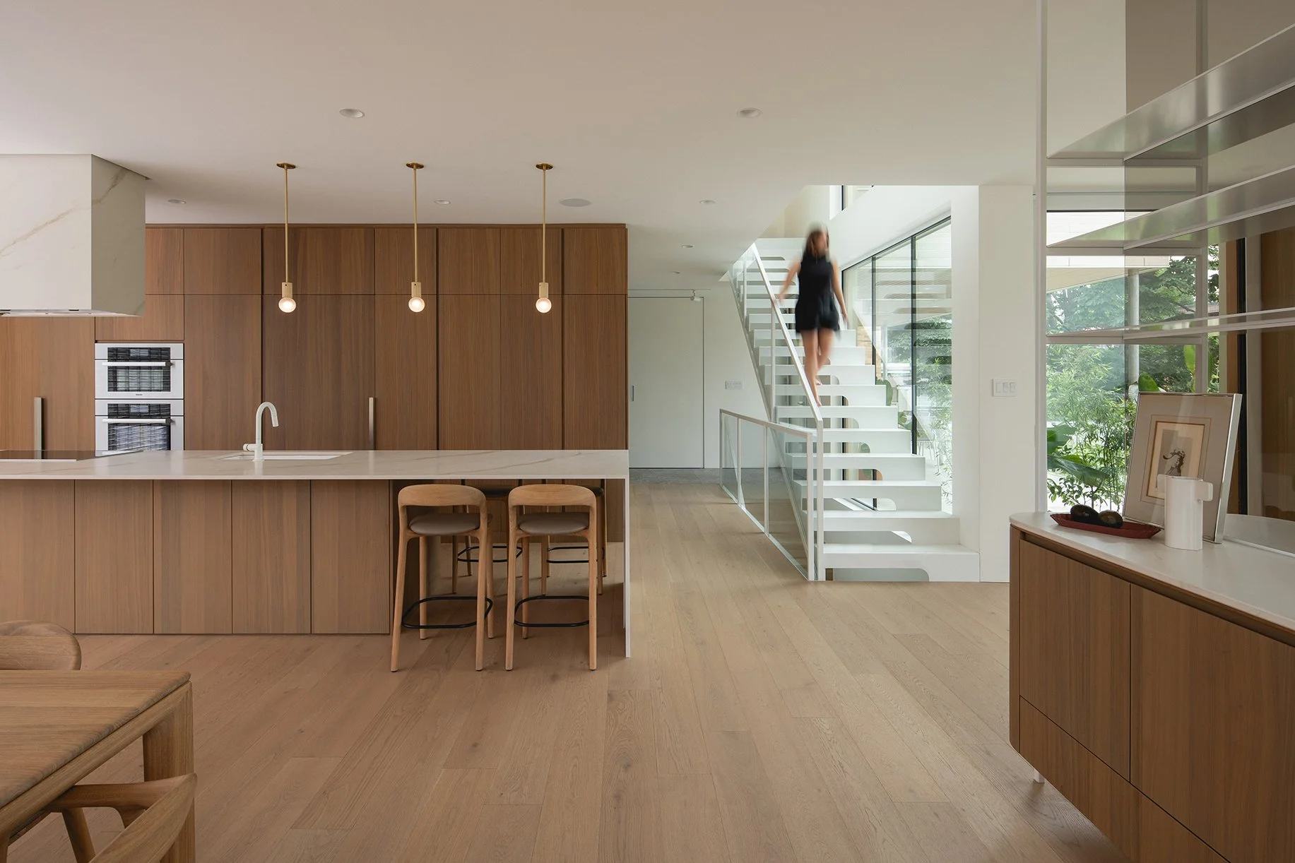 architecture-interior-contemporary-minimalist-design-dining-table-wood-white-metal-stairs-lens-montreal.jpg
