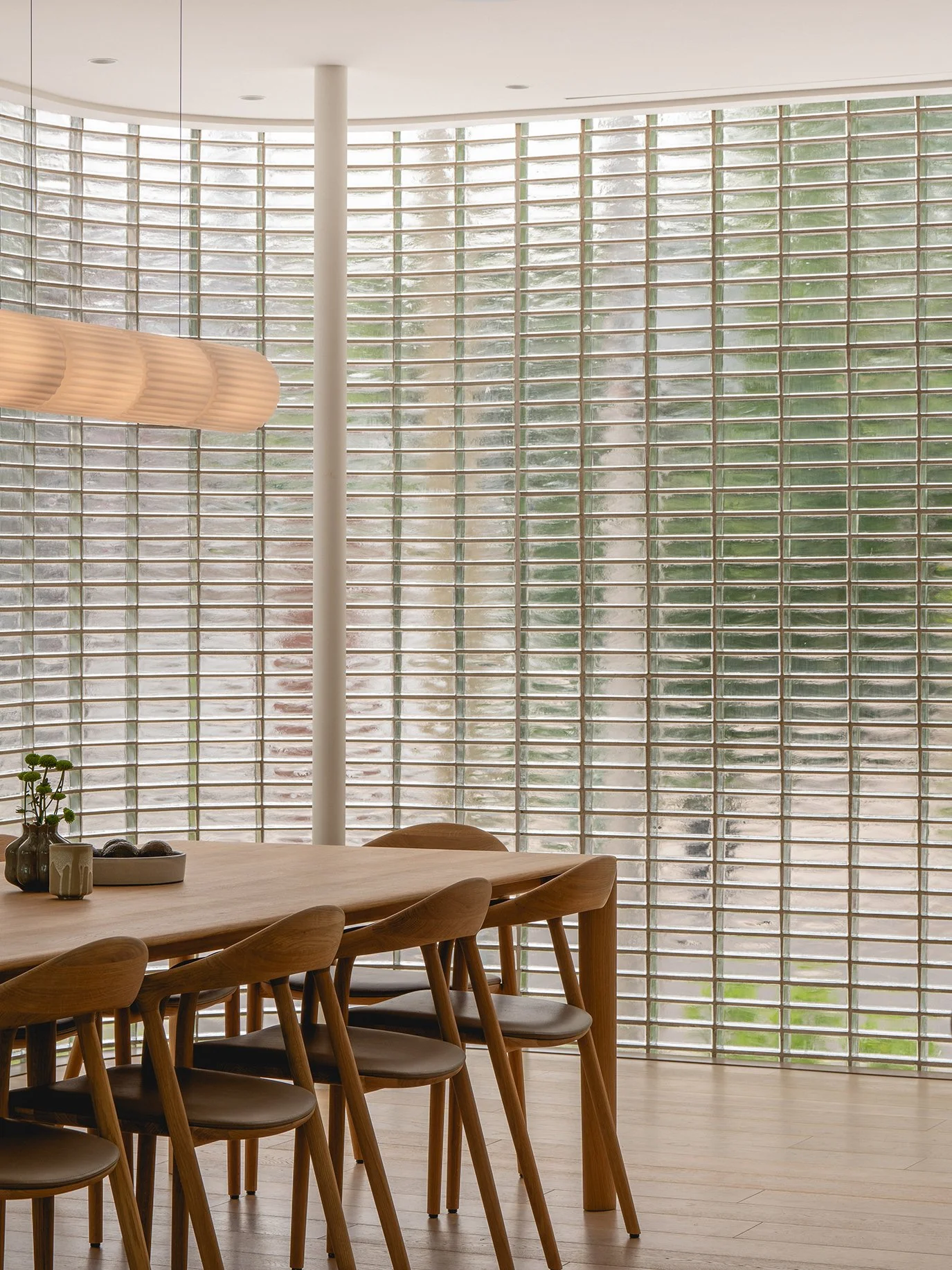 architecture-interior-contemporary-minimalist-design-dining-table-glass-bricks-wood-natural-light-lighting-detail.jpg