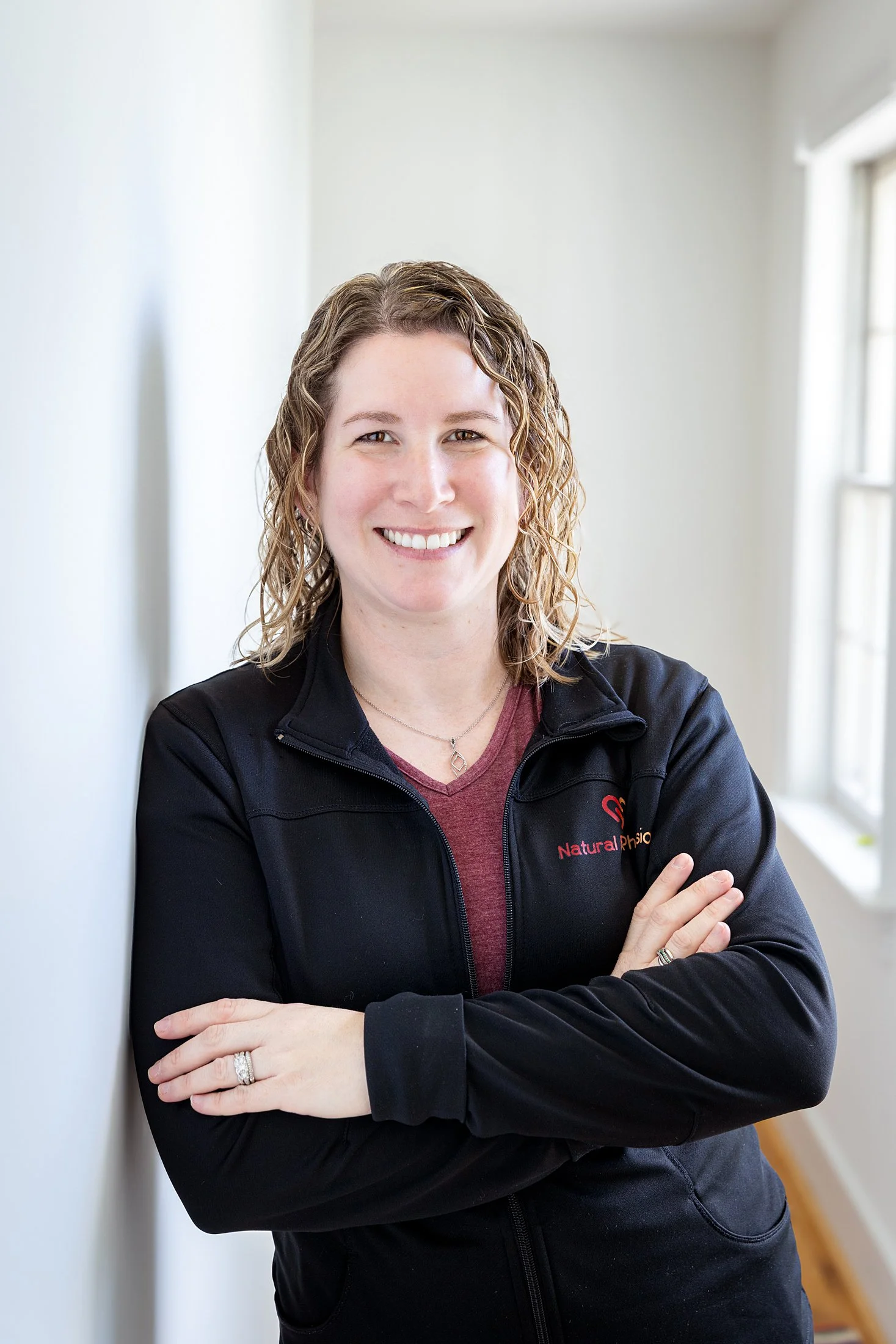 photo of Dr Kellie Soltis, smiling and arms casually crossed