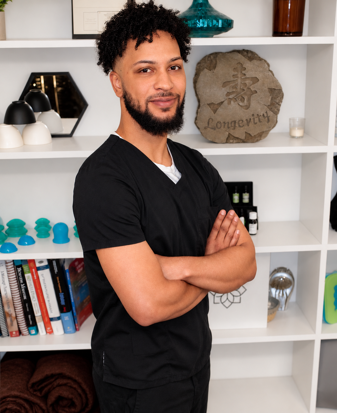 Corey, licensed massage therapist at Platinum Bliss Spa