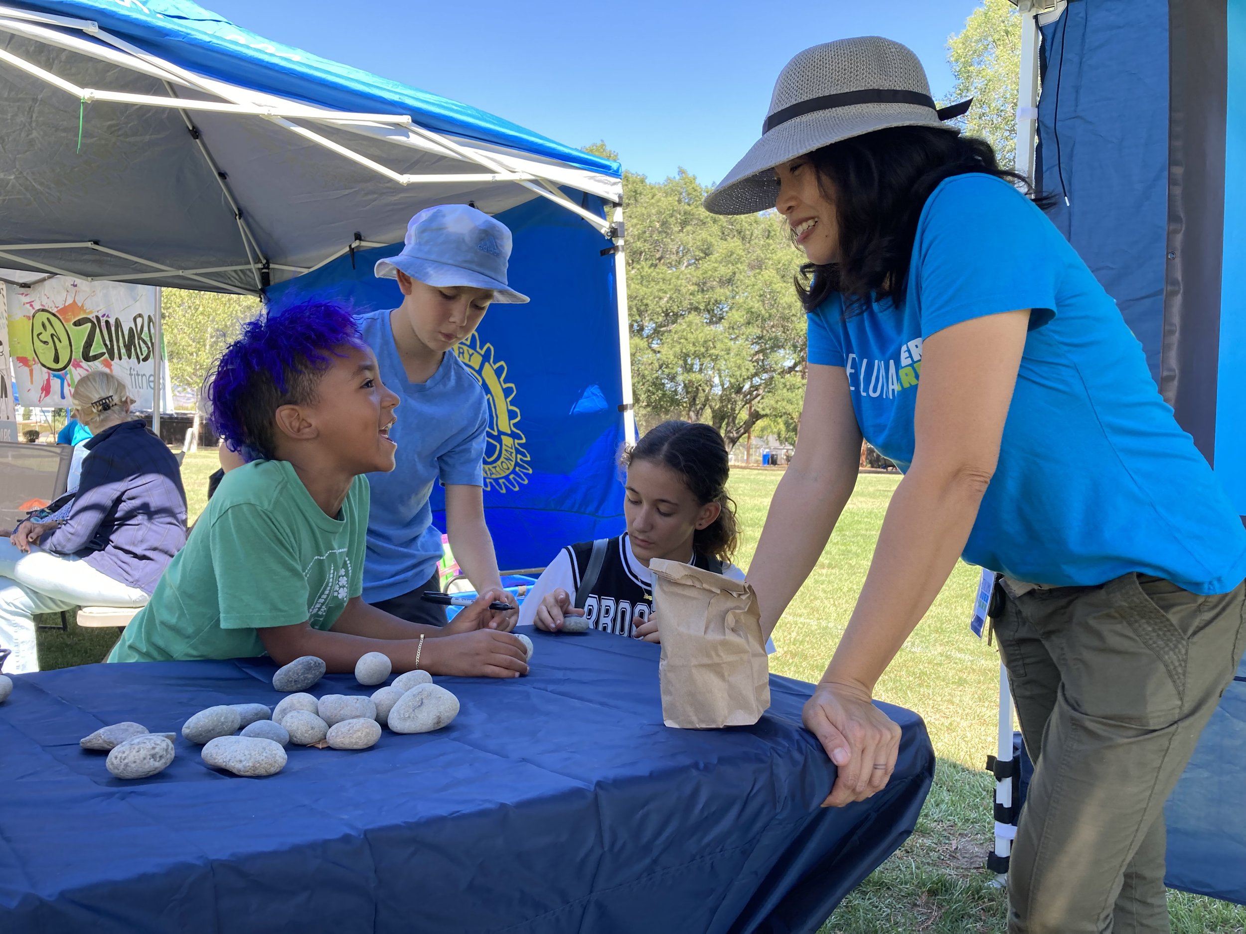 August 2022: River Park Foundation volunteers fan out and join community events to invite people to use the park and offer their ideas for its future construction.