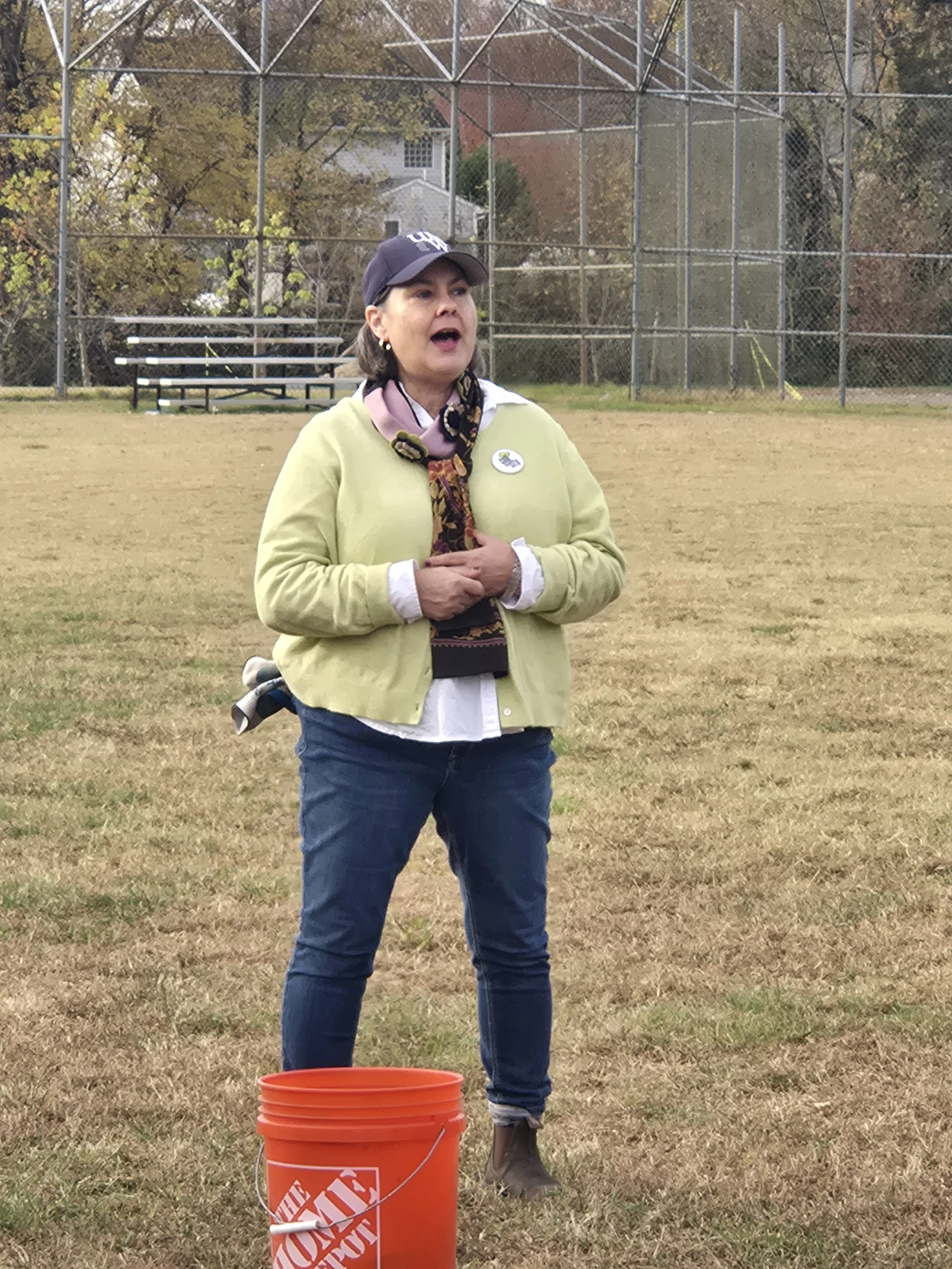 Boushall librarian Barbara Haas expresses her gratitude to the volunteers for their help planting 34 new trees.