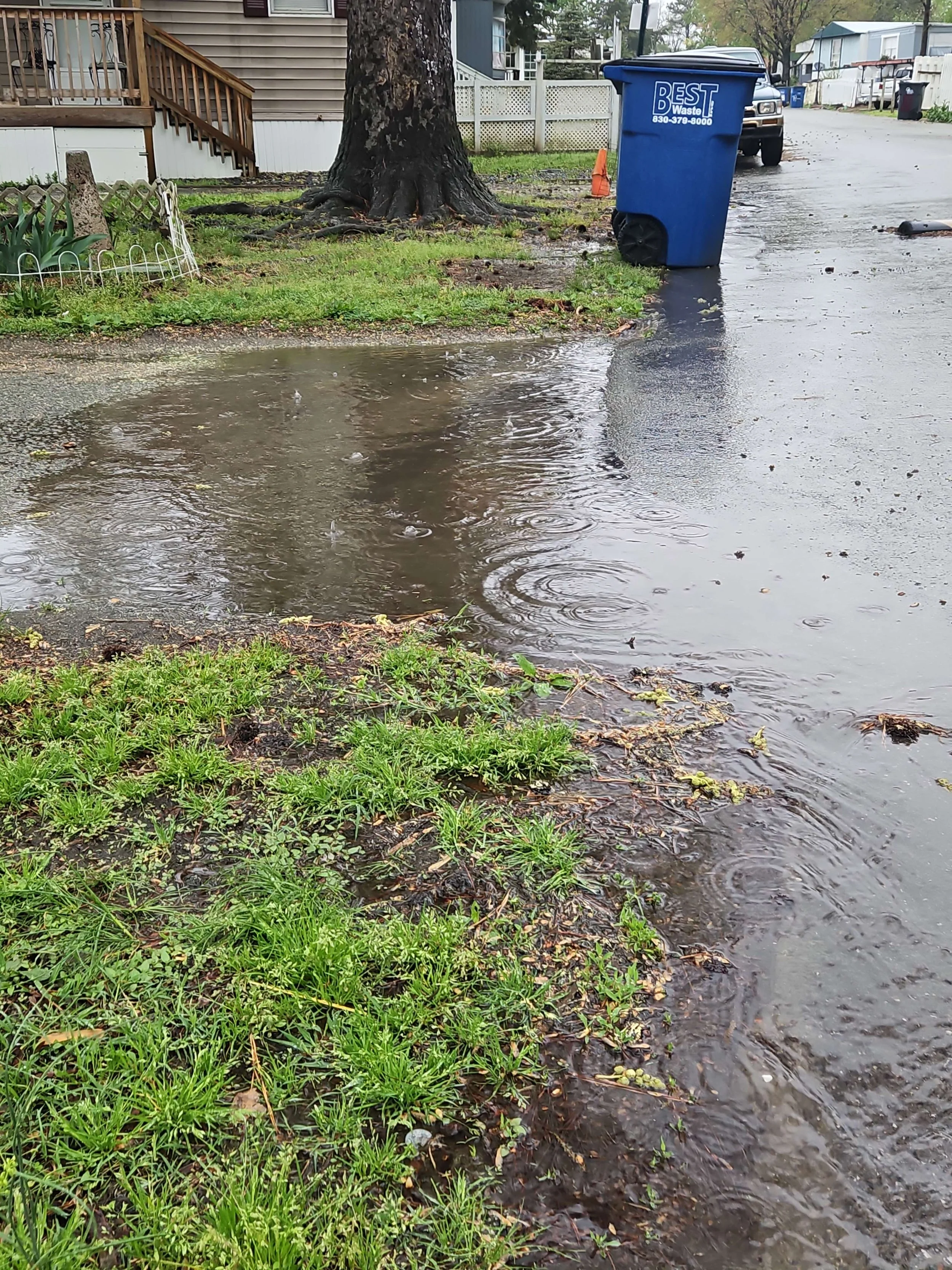 A photo of stormwater flooding in a residential neighborhood submitted by a community member through the Go with the Flow survey.