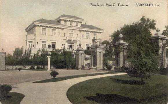 Historical photo of the gated entrance to the Claremont neighborhood in Berkeley, Ca., which had racial covenants that barred homeowners from selling or renting their homes to people of color.