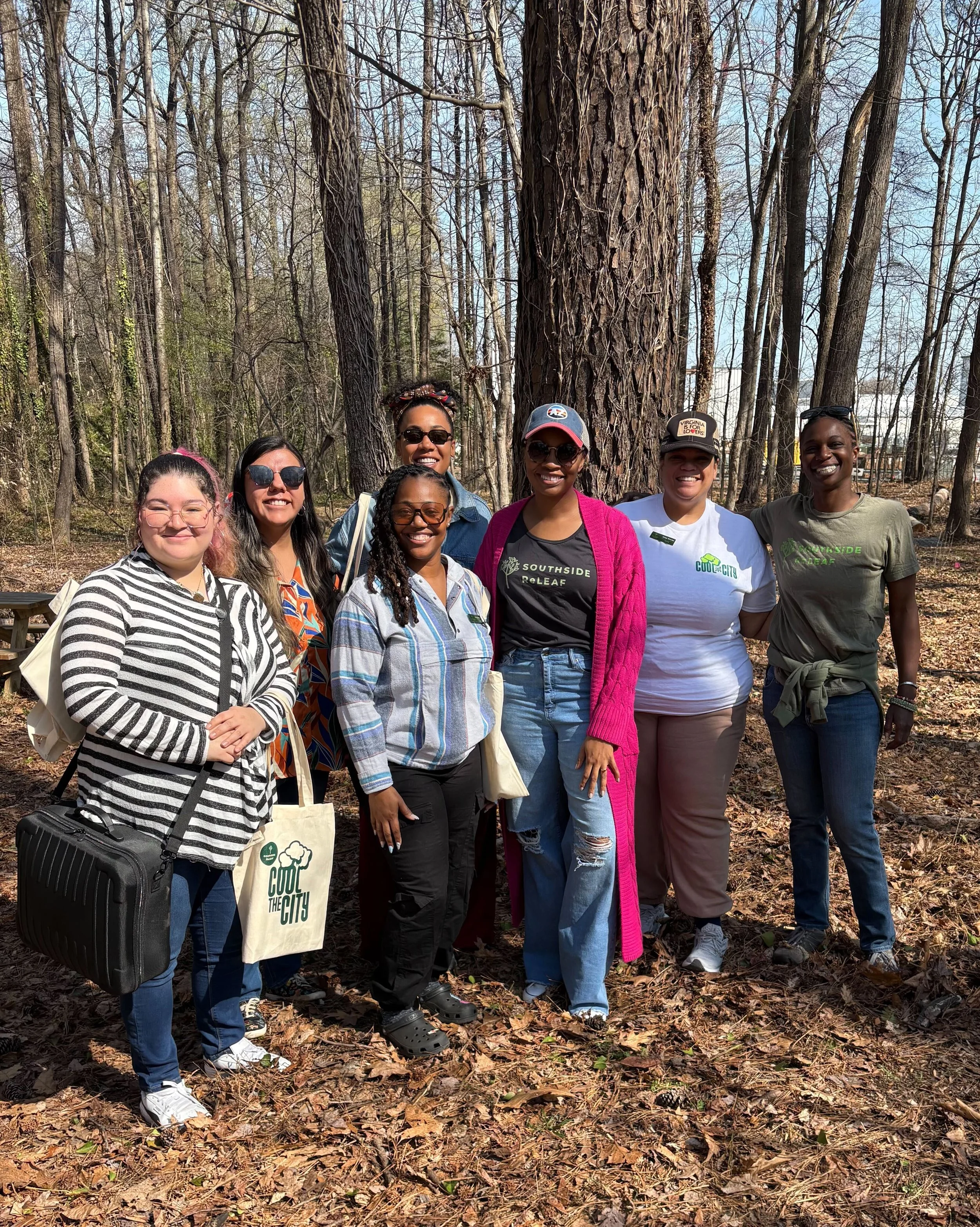 Our team with two members of the Virginia Language Justice Collections at an outdoor learning classroom.