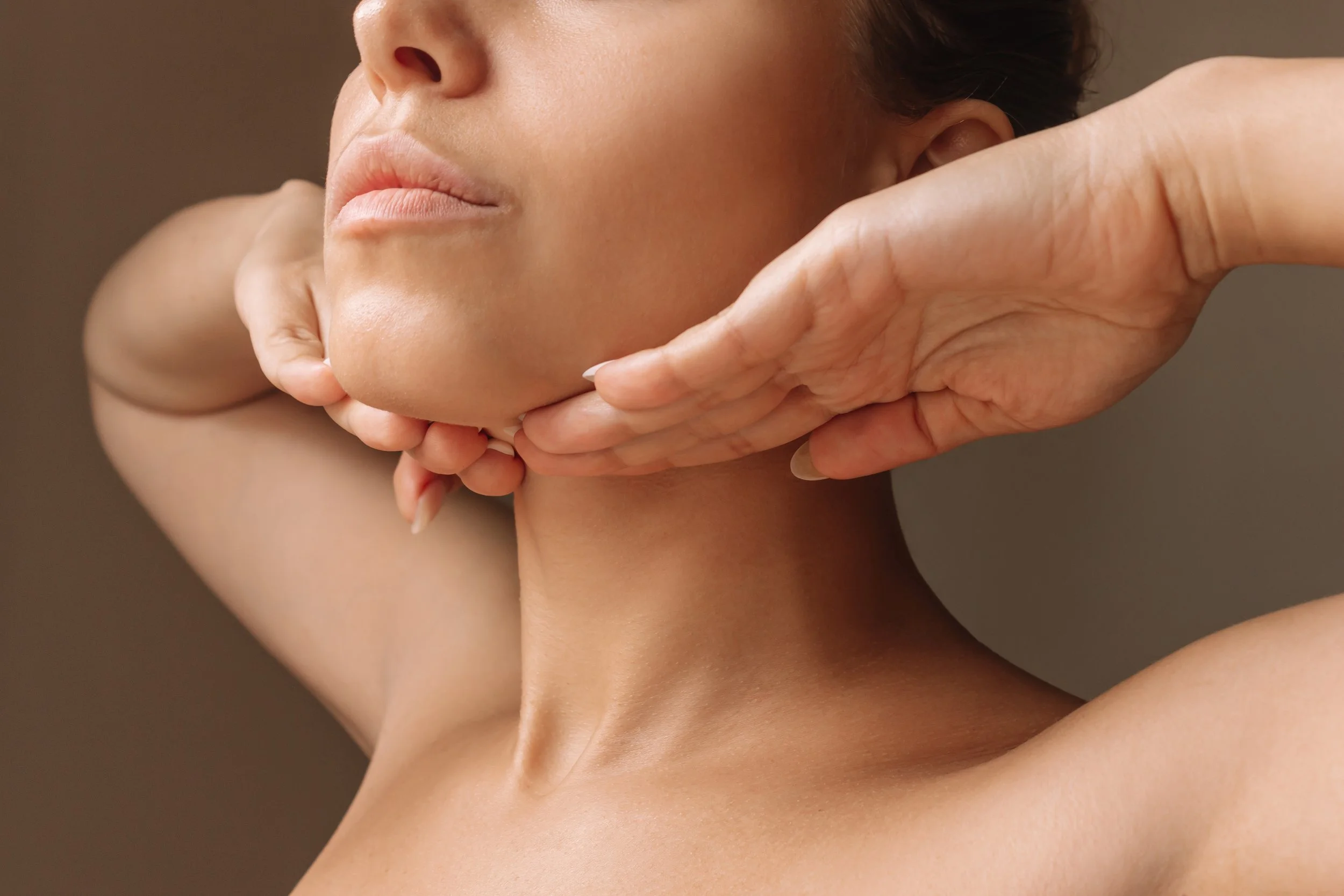Woman's neck after Neck Rejuvenation treatment at San Clemente, CA medical spa.