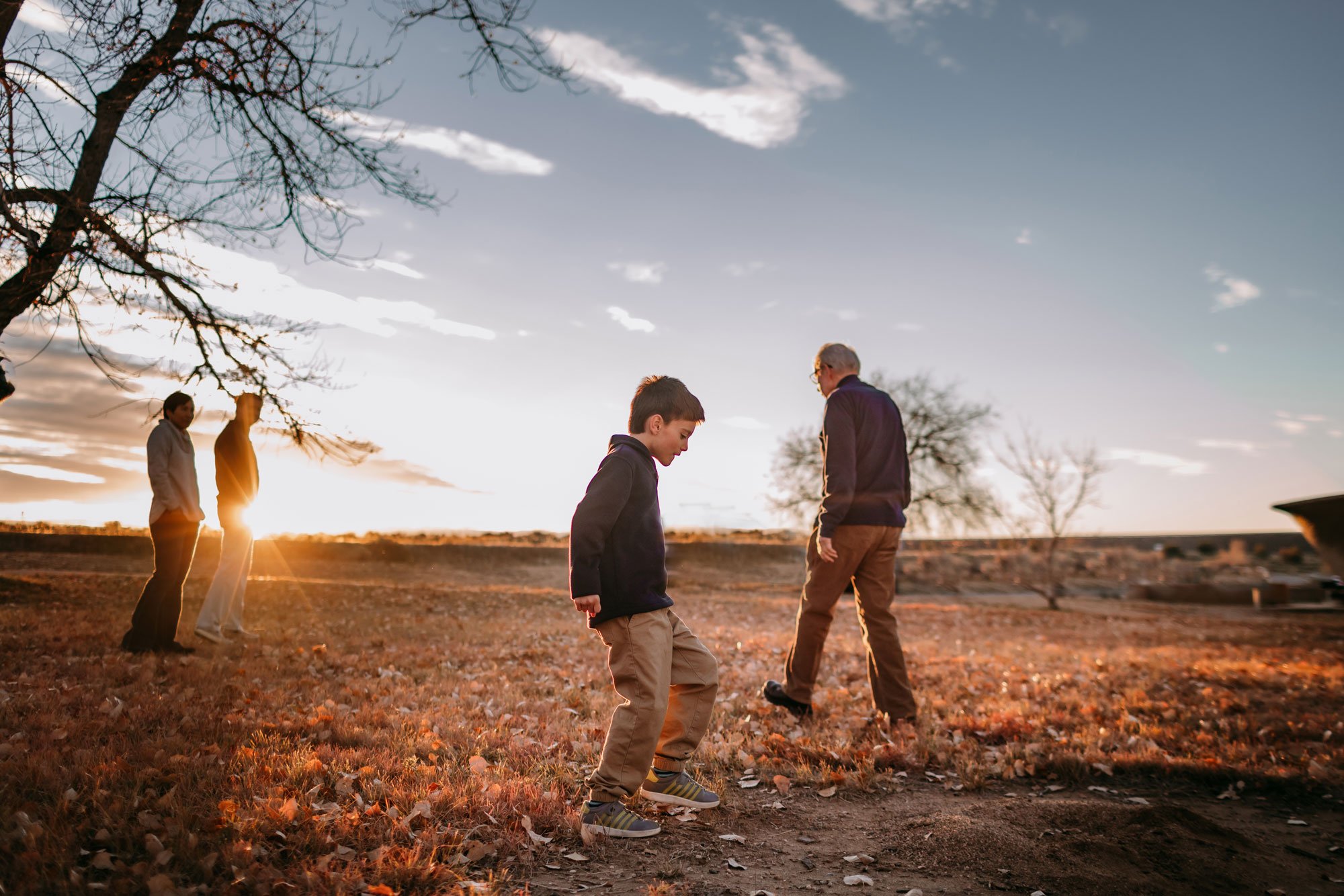 family-outdoor-in-sunset-light.jpg