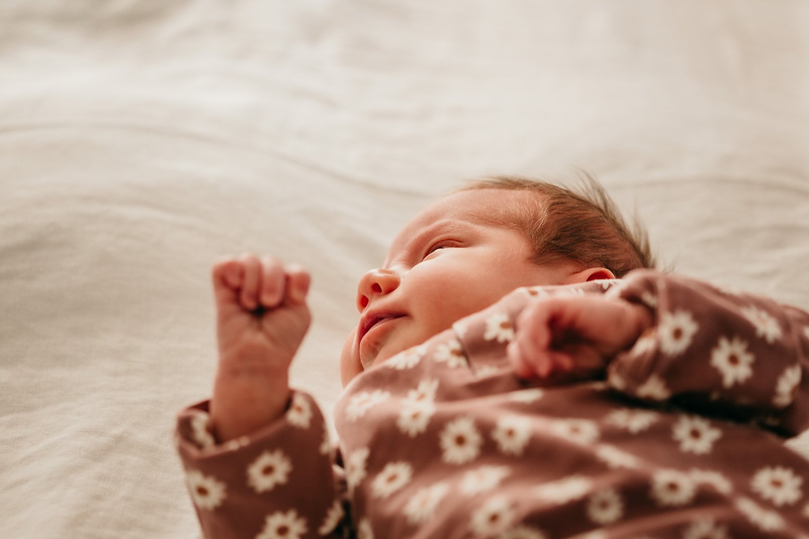 newborn-peacefully-rest-on-bed.jpg