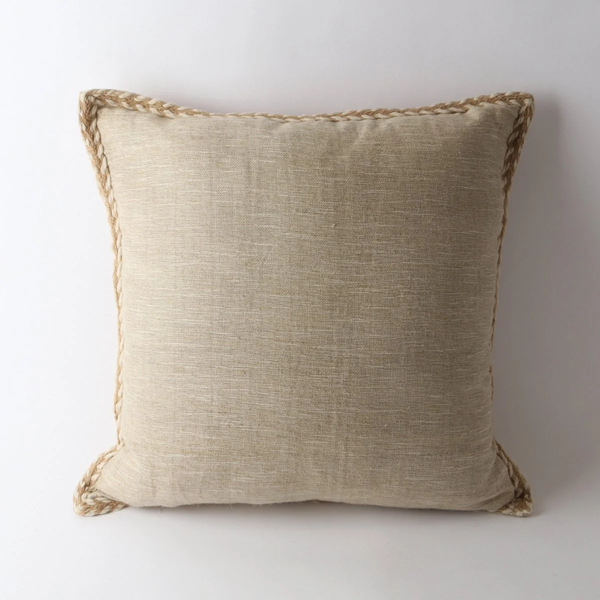 Le-Forge-Handloom-C-ushion-in-natural-with-edge-detail.jpg