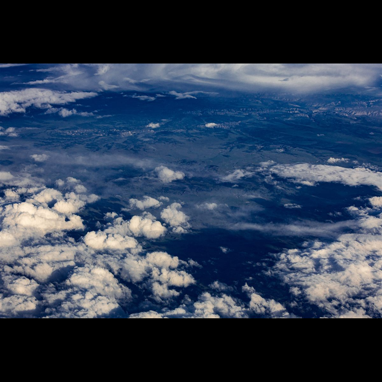 Standalone August cloud photograph from the 2027 Cloud Calendar