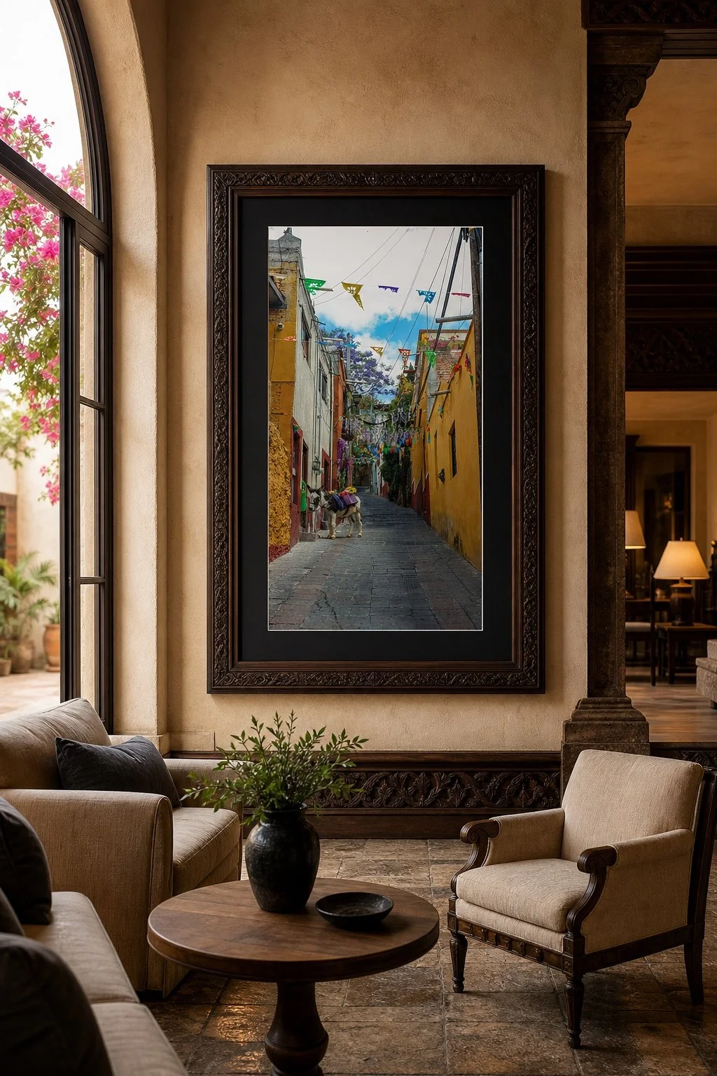 The Lonely Burro displayed in an ornate dark wood frame inside a luxury Mexican residence