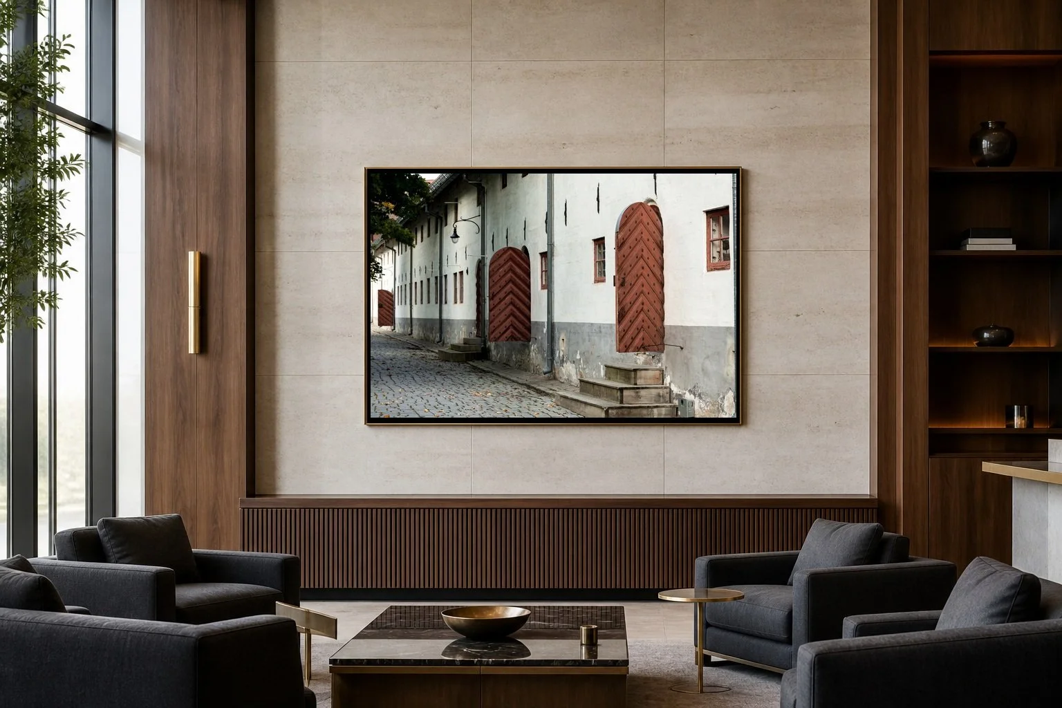 Akershus Fortress displayed in a black frame inside a contemporary wood-paneled lounge