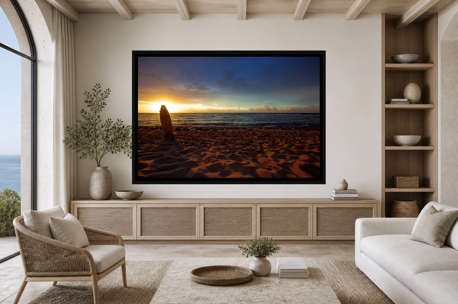 Last Board Out displayed in a black frame within a restrained coastal residence with pale stone, white oak, woven seating, and a clear central wall