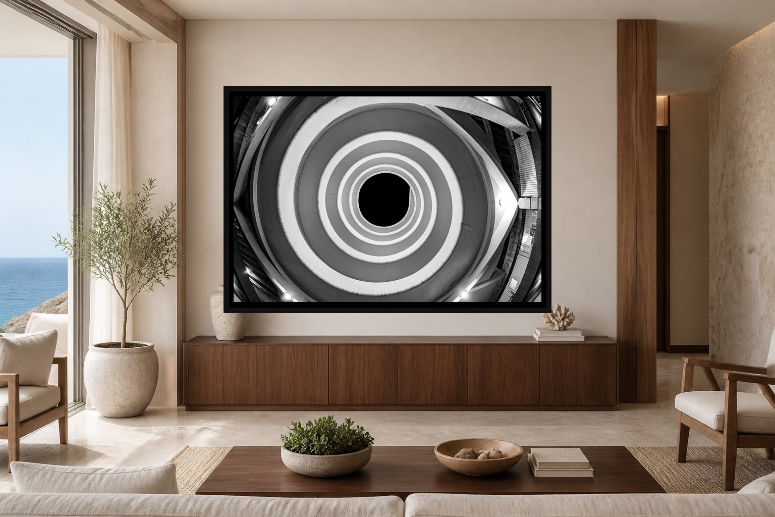 Circular Reasoning displayed in a black frame within a refined oceanfront hotel lounge with pale limestone, walnut, cream linen, and a clear central wall