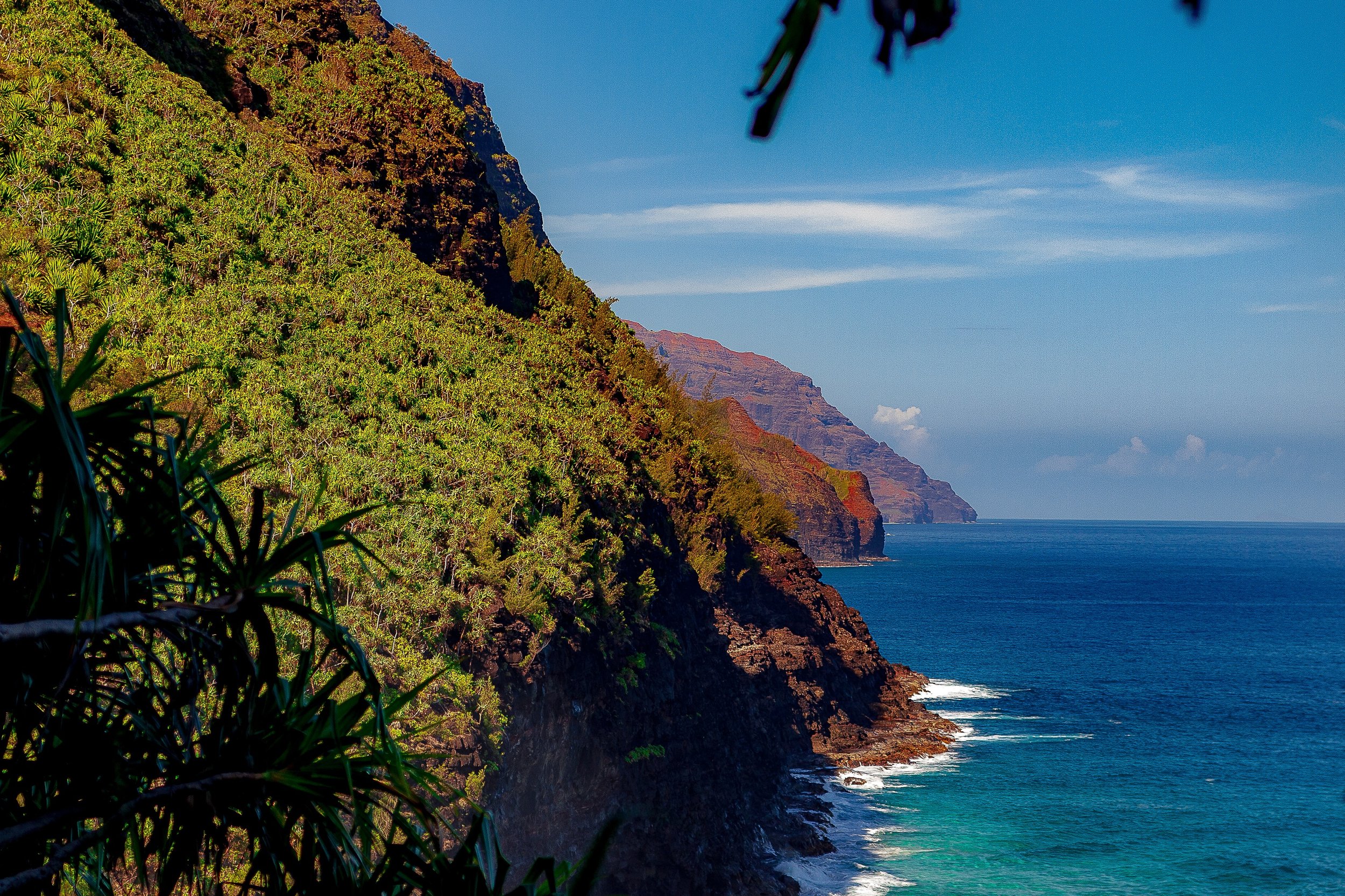 Detail crop from Framed Coast, emphasizing small lines of surf reveal the scale of the cliffs below