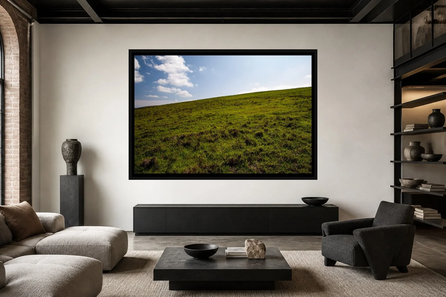 The Green Incline displayed in a black frame within a modern collector's loft with white plaster, blackened steel, textured fabrics, and a clear central wall