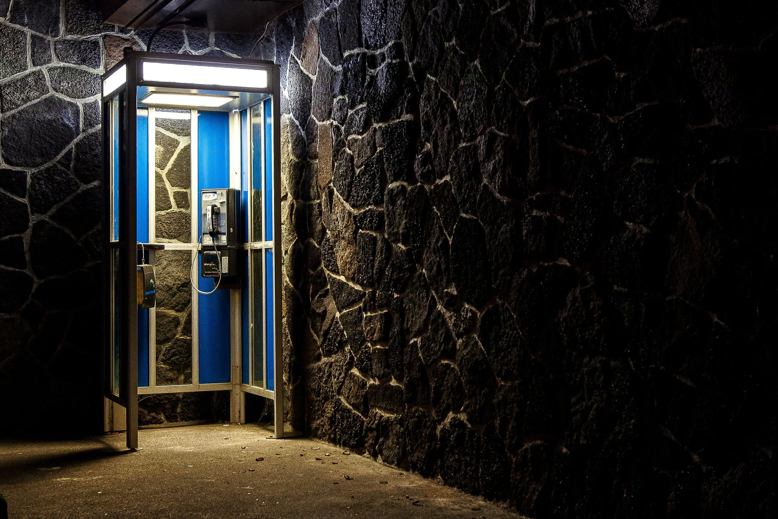 Detail crop from Open After Dark, emphasizing small reflections and blue edges inside the doorway suggest more space than the exterior reveals