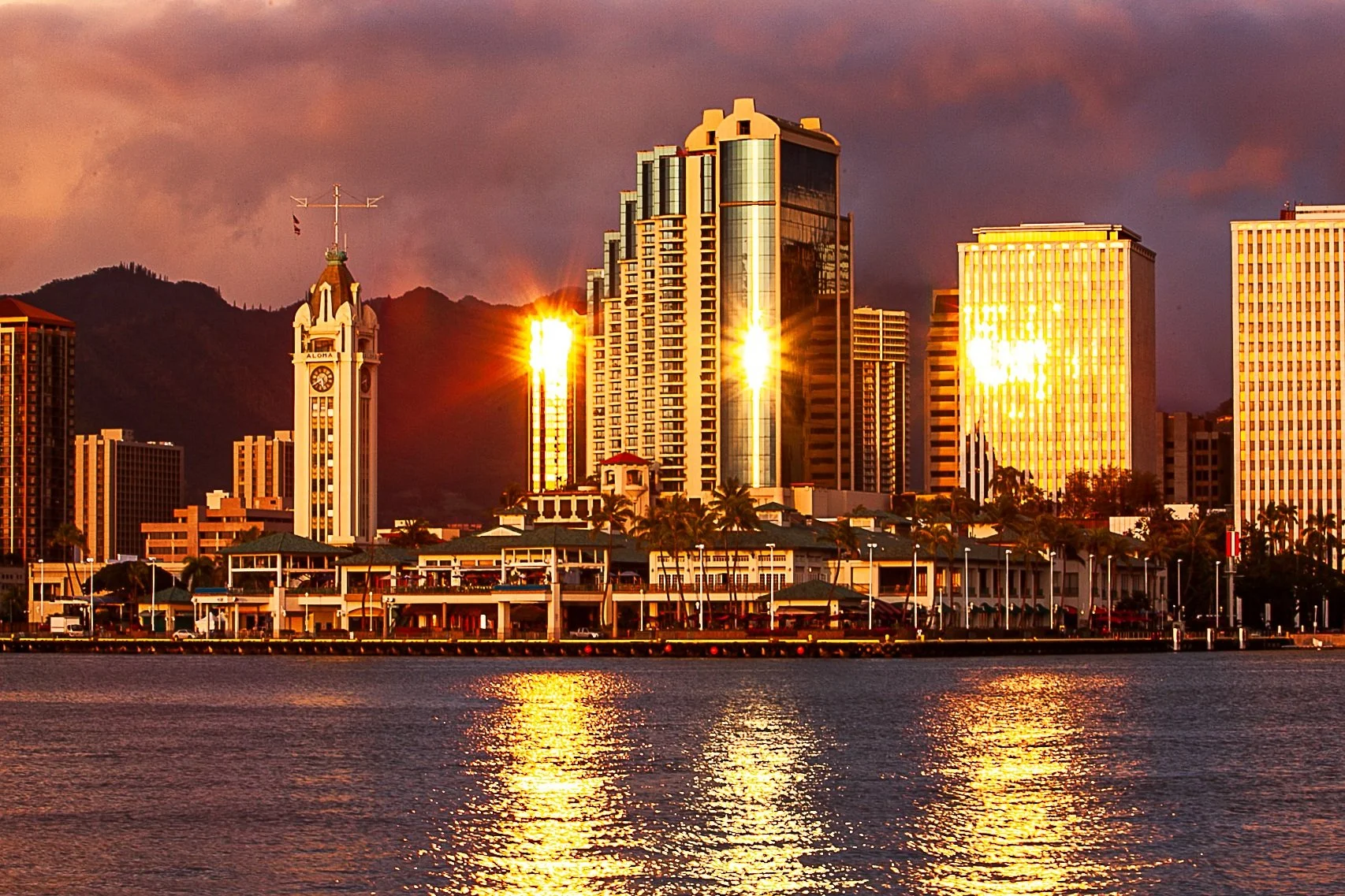 Detail crop from Golden Waterfront, emphasizing different reflections stretch and break according to each building's position