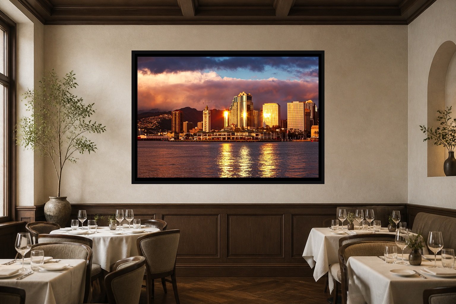 Golden Waterfront displayed in a black frame within an intimate fine-dining room with plaster walls, dark wood, linen tables, no guests, and a clear central wall
