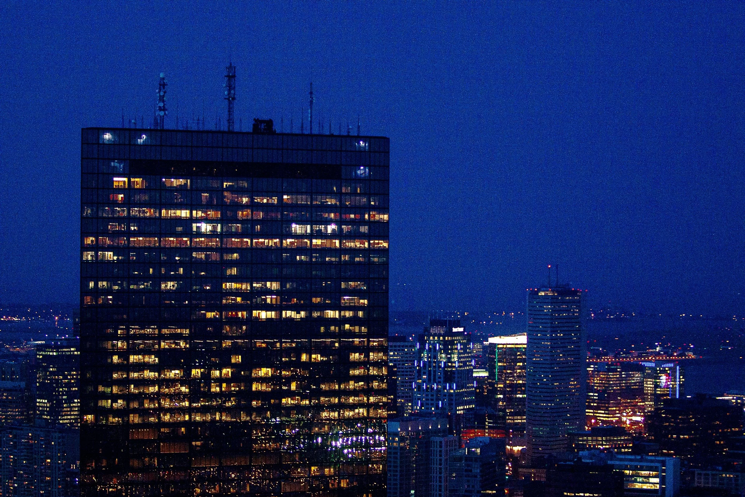 Detail crop from One Building Awake, emphasizing subtle skyline lights around the tower prevent it from becoming isolated